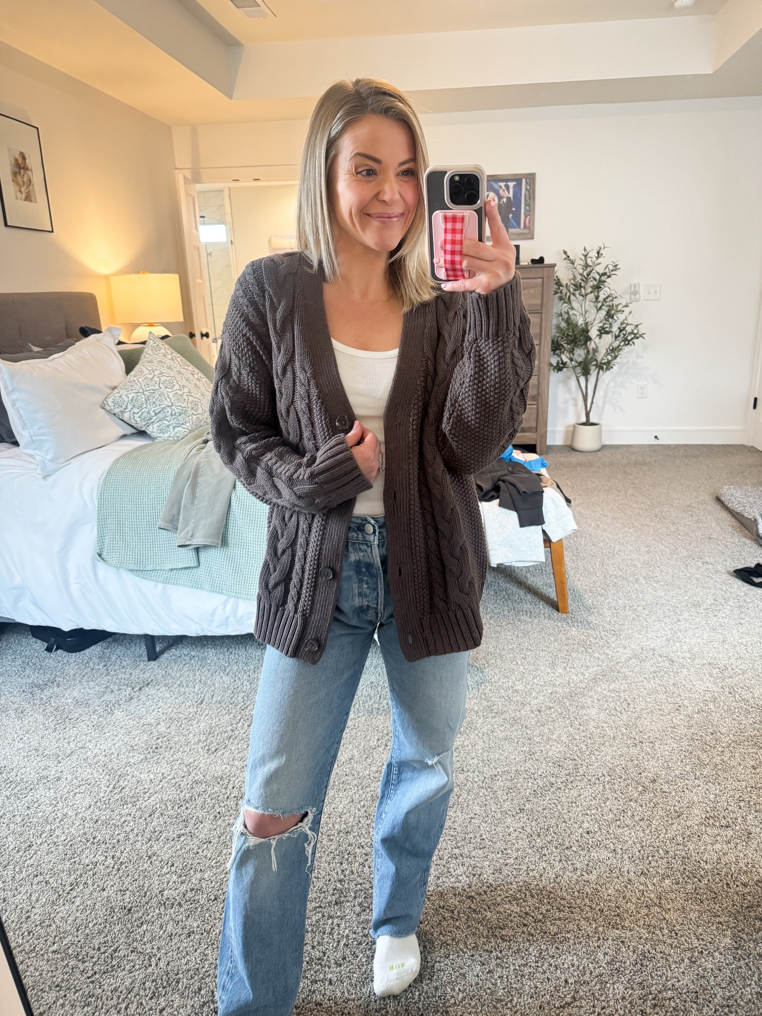 This quince cable cardigan is so pretty and comfy - true to size (in a S)

