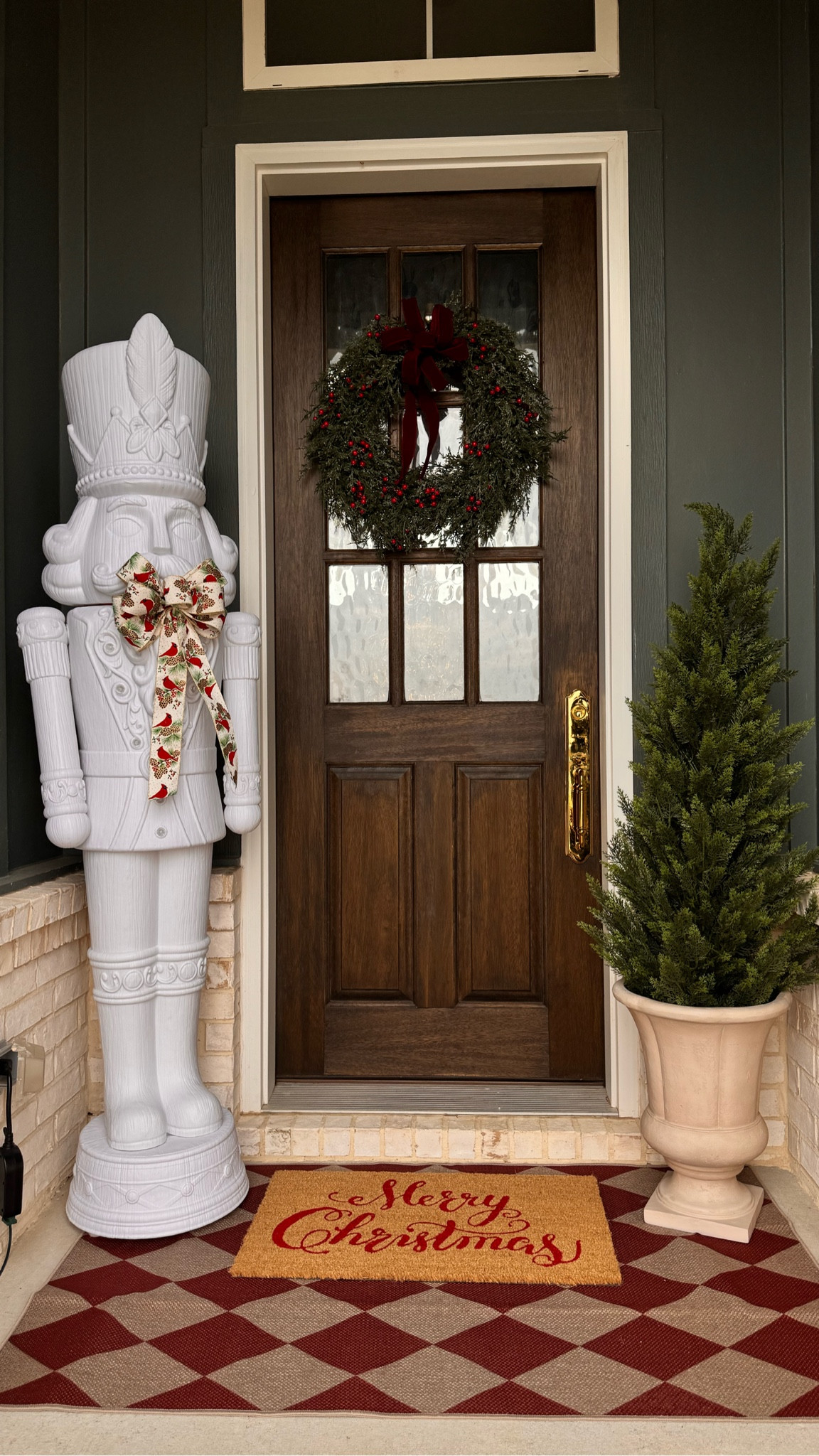 nutcracker décor, Christmas porch ideas, cedar trees, outdoor doormat, holiday entryway, front porch styling, red holiday mat, Christmas home finds, neutral Christmas decor, outdoor Christmas decorations

#LTKHoliday #LTKHome #LTKSeasonal