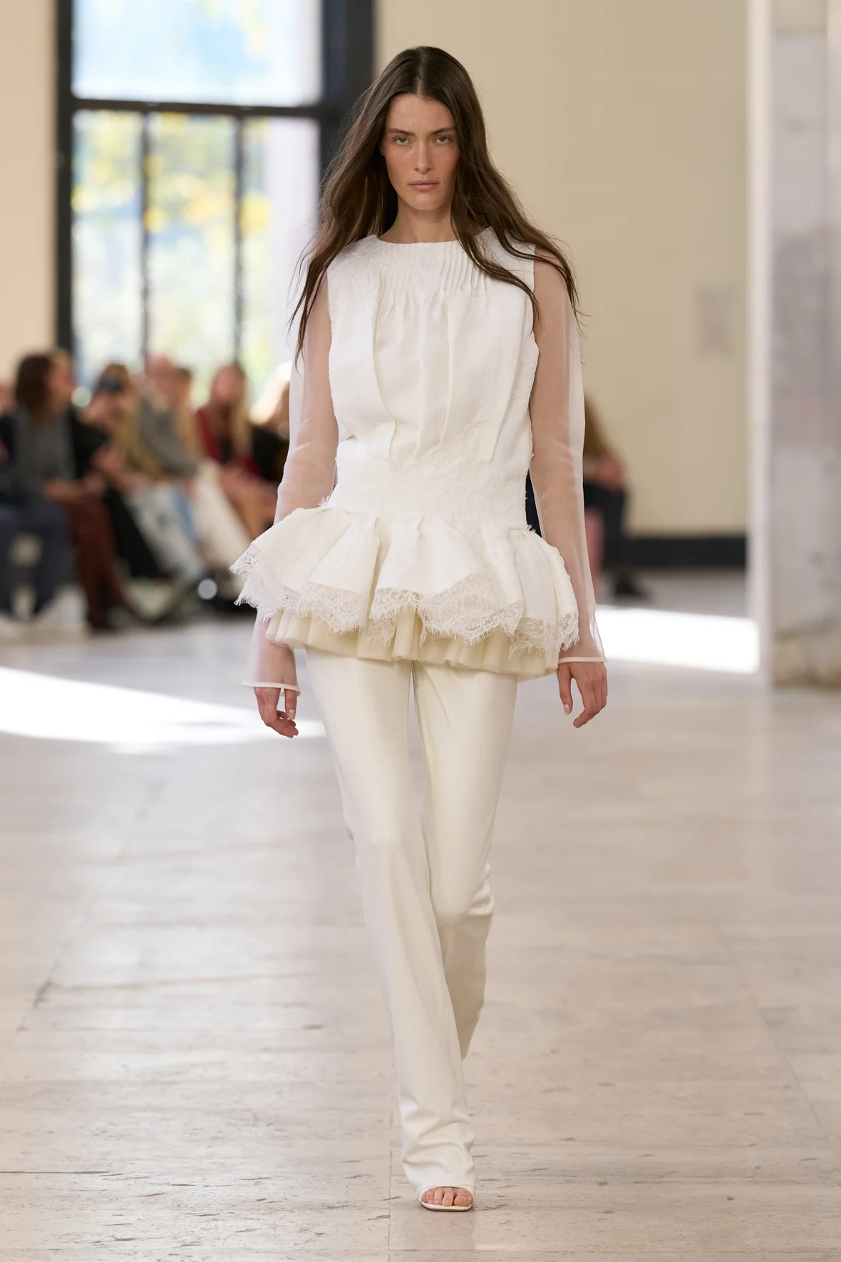 A satin day-to-night icon elevated with intricate lace detailing and a softly exaggerated skirt t... | aje. (US, UK, Europe, ROW)