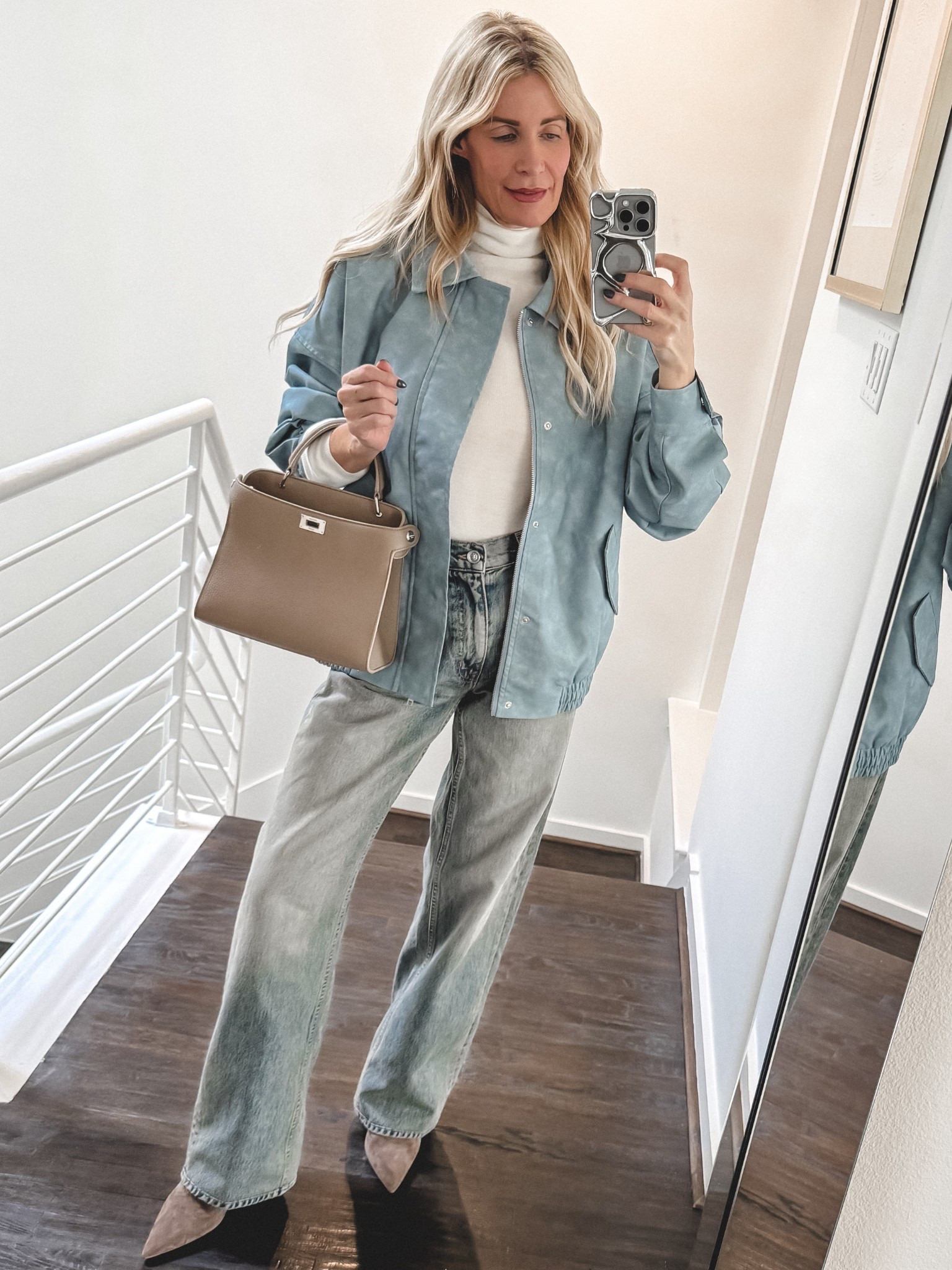 This baby blue bomber jacket instantly freshens up any denim look and feels modern without trying too hard. It’s that perfect lightweight layer that works now and transitions beautifully into spring — easy, polished, and very wearable. I’m wearing the baby blue bomber jacket in XS and it fits true to size. 

 #LTKootd #LTKOver40 #LTKFindsUnder100