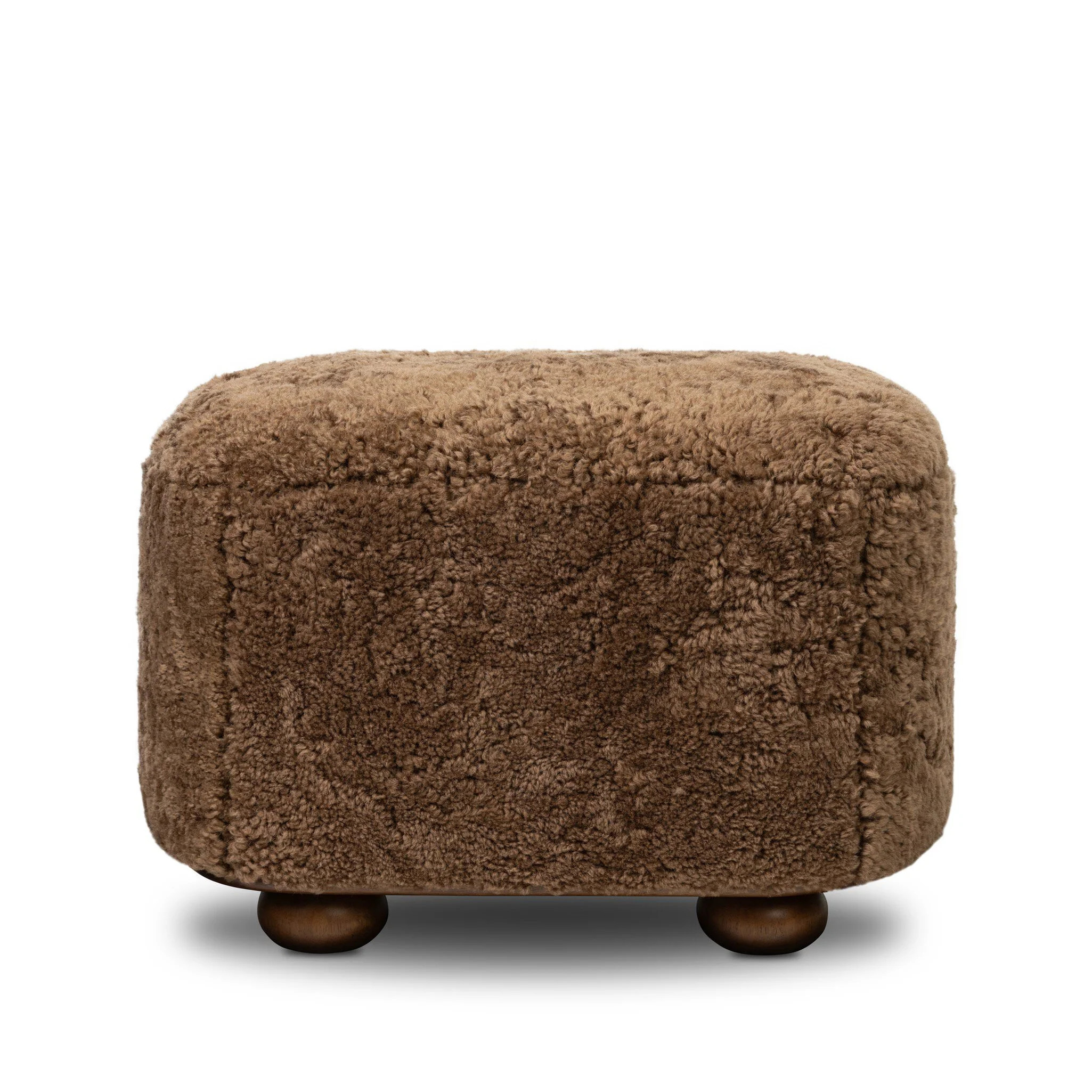 Four Hands Bilbury Oval Ottoman in Amber Shearling | The Addison West