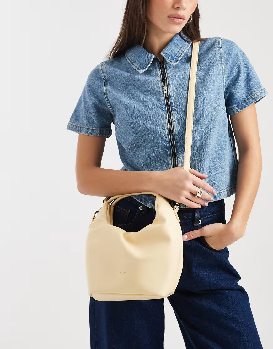 PASQ small top handle and crossbody draw string bag in butter yellow | ASOS (Global)