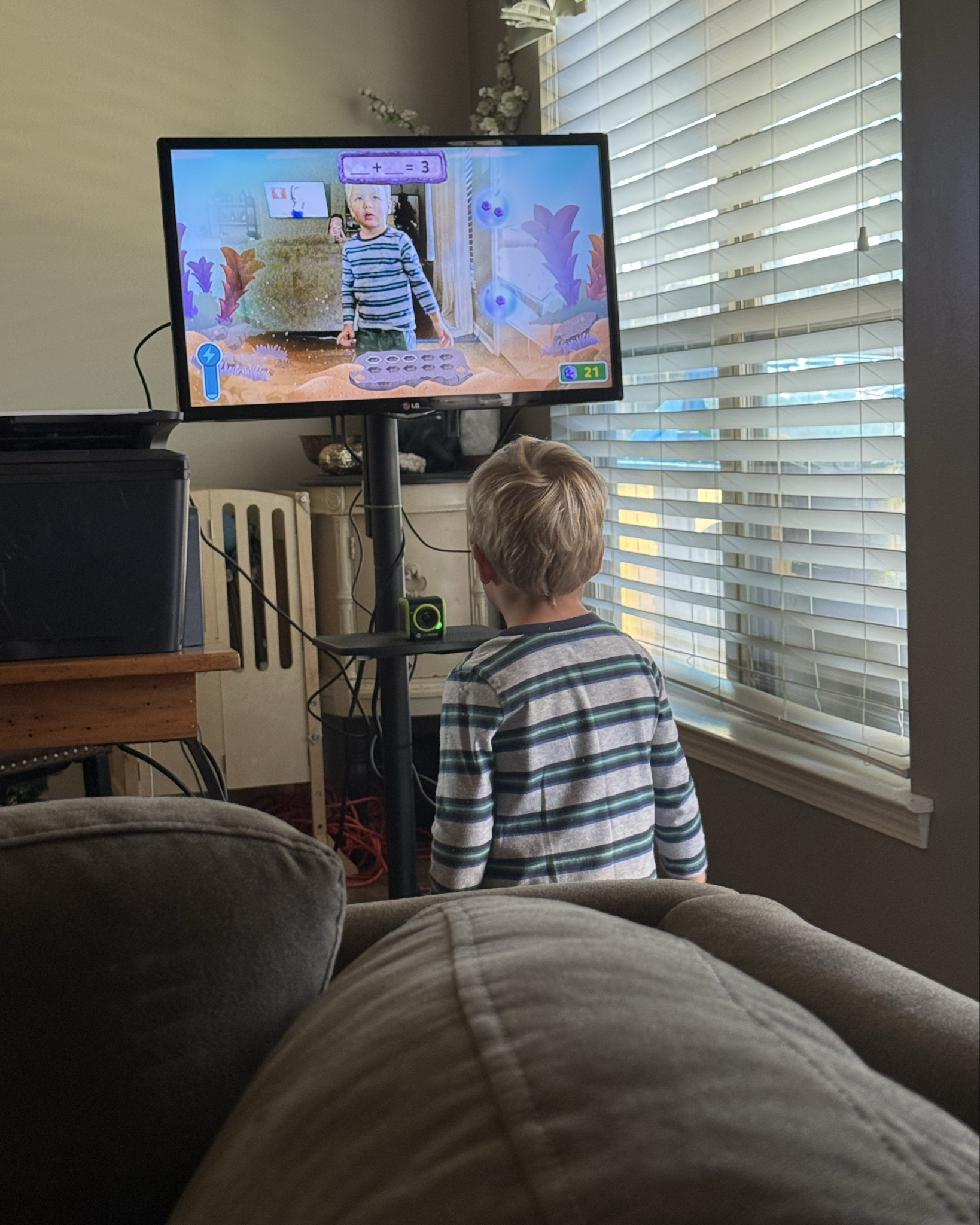 Another win for the rolling tv stand! I had stuff everywhere trying to get Christmas decorations set up, but little man wanted to exercise! He’s been loving being able to play his Leapfrog Leapmove game whenever and whereever! 

#LTKdayinmylife #LTKHoliday #LTKmomlife
