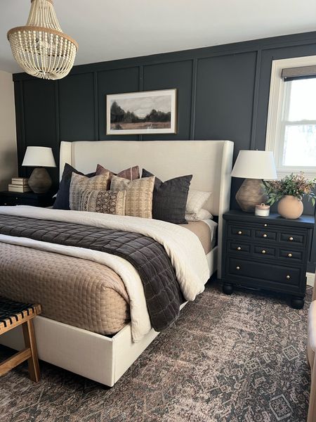 Moody bedroom with pottery barn quilt and duvet, overstock chandelier and loloi bedroom rug 

#LTKstyletip #LTKSeasonal #LTKhome