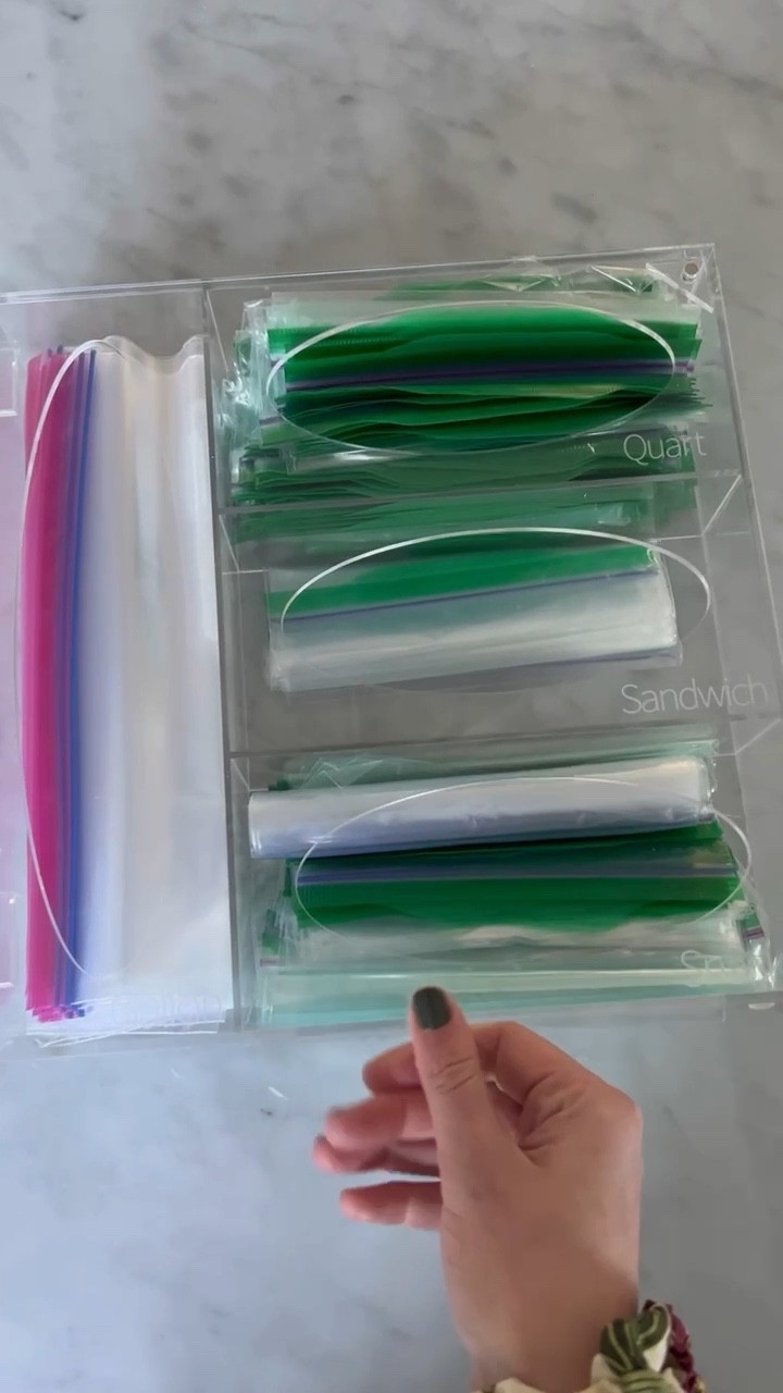 I've been searching for an acrylic bag organizer and finally found this- we LOVE it! Saves a ton of space & lets me know at a glance when we are running low on a particular size.

#LTKfamily #LTKunder50 #LTKhome
