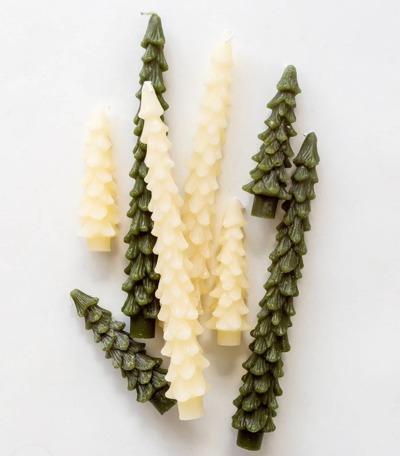 Christmas tree taper candles 🌲

Holiday home decor 
Christmas table 
Christmas home 
Classic Christmas 

#LTKHoliday #LTKSeasonal #LTKHome