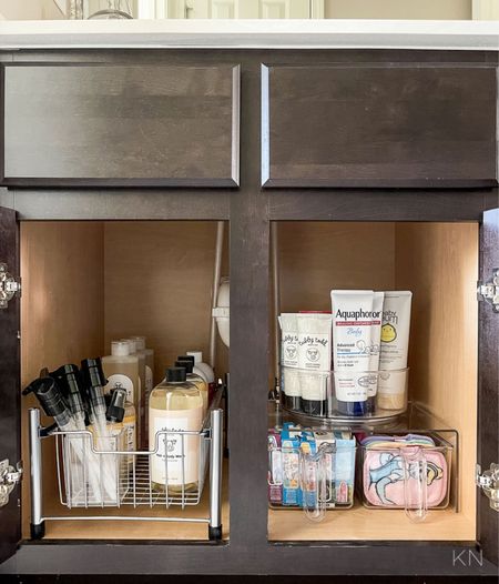 It can be a challenge to organize a drawer-less bathroom vanity unless you have some key storage components so that items are easily accessible. I added this wire pull out organizer, divided handled bins, a divided turntable and an acrylic shelf so that I could utilize wasted vertical space. home organization bathroom organization vanity organization cabinet organization home storage bathroom storage cabinet storage toiletry organization 

#LTKfindsunder50 #LTKstyletip #LTKhome