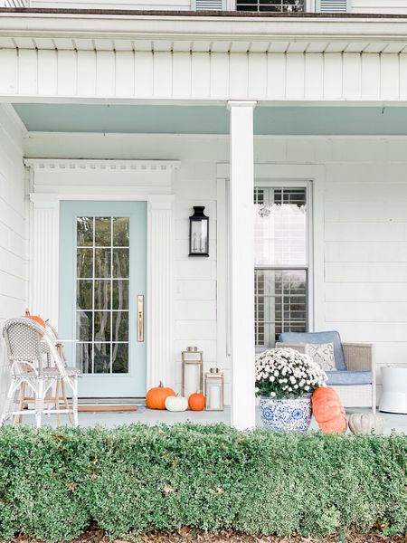 Our farmhouse fall front porch.  All items are linked.  Fall porch, serena and lily, fall, front porch, blue and white planters, riviera outdoor chair, Pacifica chair, door hardware, wall lantern, gold lanterns, target find, Wayfair  

#LTKSeasonal #LTKhome