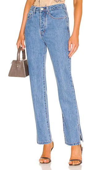 Riley Side Slit Jean in Medium Wash | Revolve Clothing (Global)