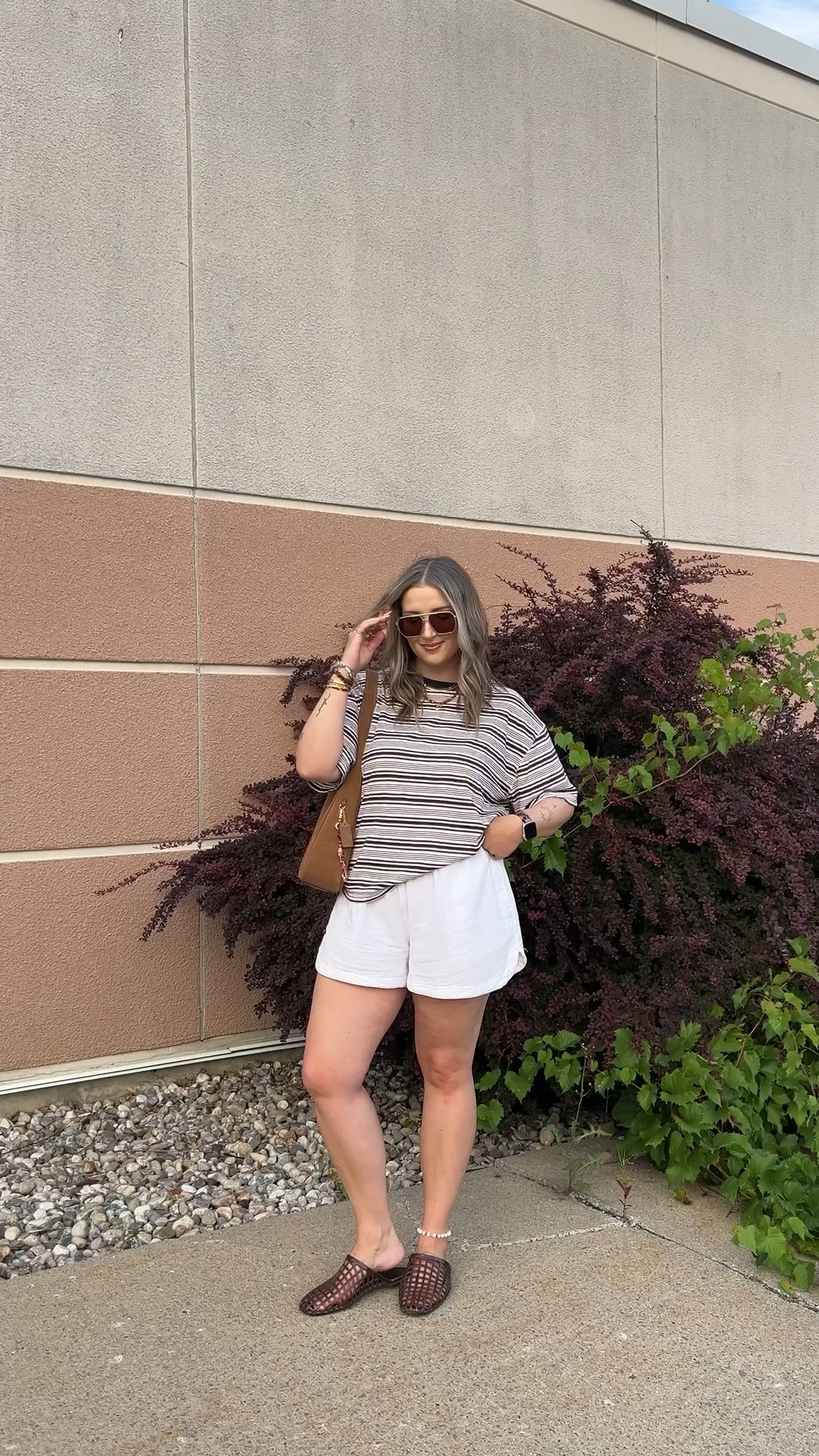 Simple summer to fall transition outfit! Wearing L in the striped tee. Shorts are old, linked similar. I’m a 9.5-10 shoe and wear a 10 in the jelly shoes (Canadian link under “similar products”). Also linked other jelly options!

#LTKsummer #LTKsale #LTKmidsize