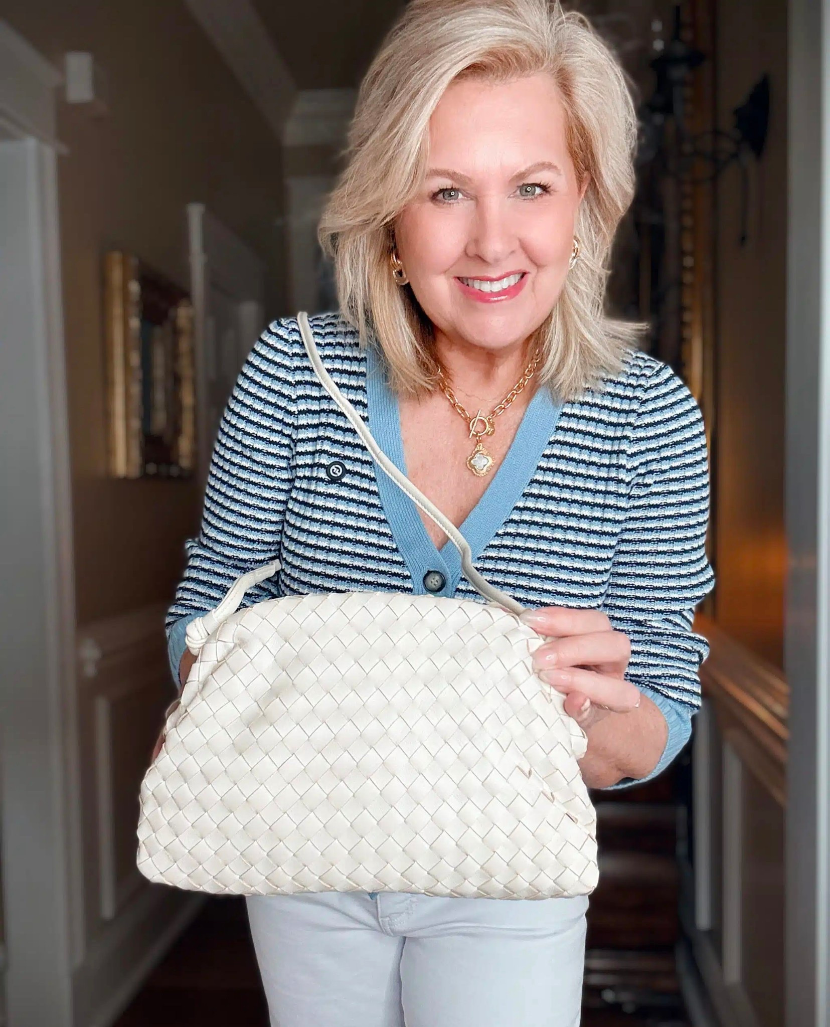 This handbag is a great option for Spring and Summer! It’s from Quince and comes in a few different colors. My cardigan is a large and jeans are a size 8. 

#LTKOver40 #LTKWorkwear #LTKootd