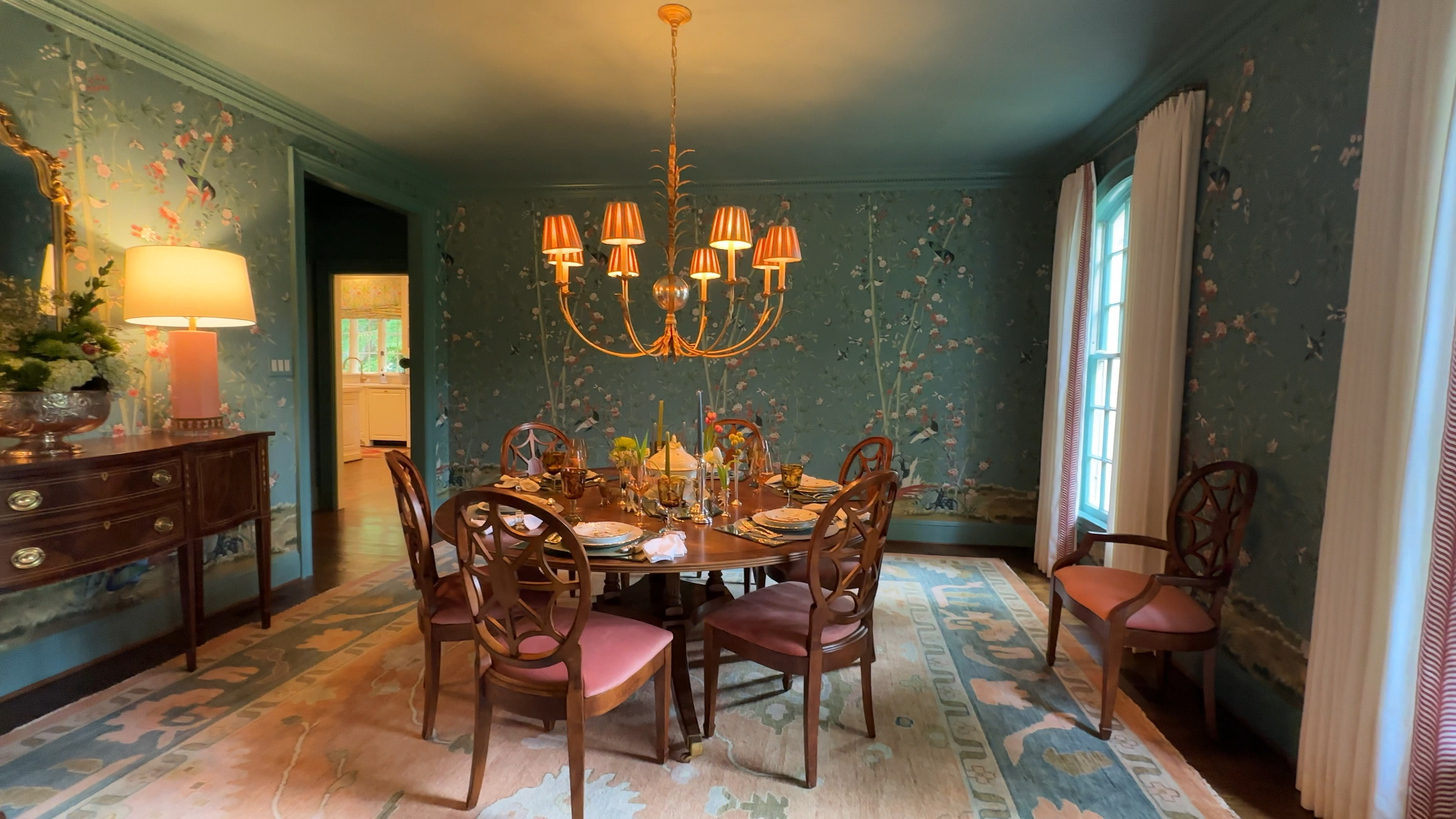 During a home tour this summer, I captured this Visual Comfort chandelier in a Schumacher wrapped dining room with traditional mahogany furniture and modern oushak rug. The chandelier is currently 20% off during Visual Comfort’s Black Friday sale!

#LTKSaleAlert #LTKHome #LTKCyberWeek