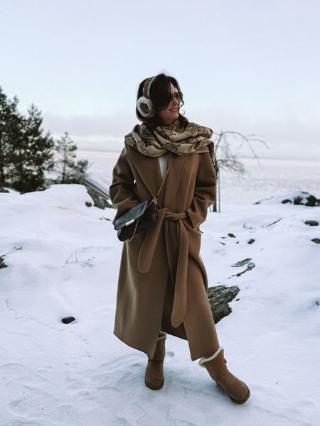 Winter wonderland with long coat, Ugg’s and ear muffs🤎❄️

#LTKstyletip #LTKeurope #LTKSeasonal
