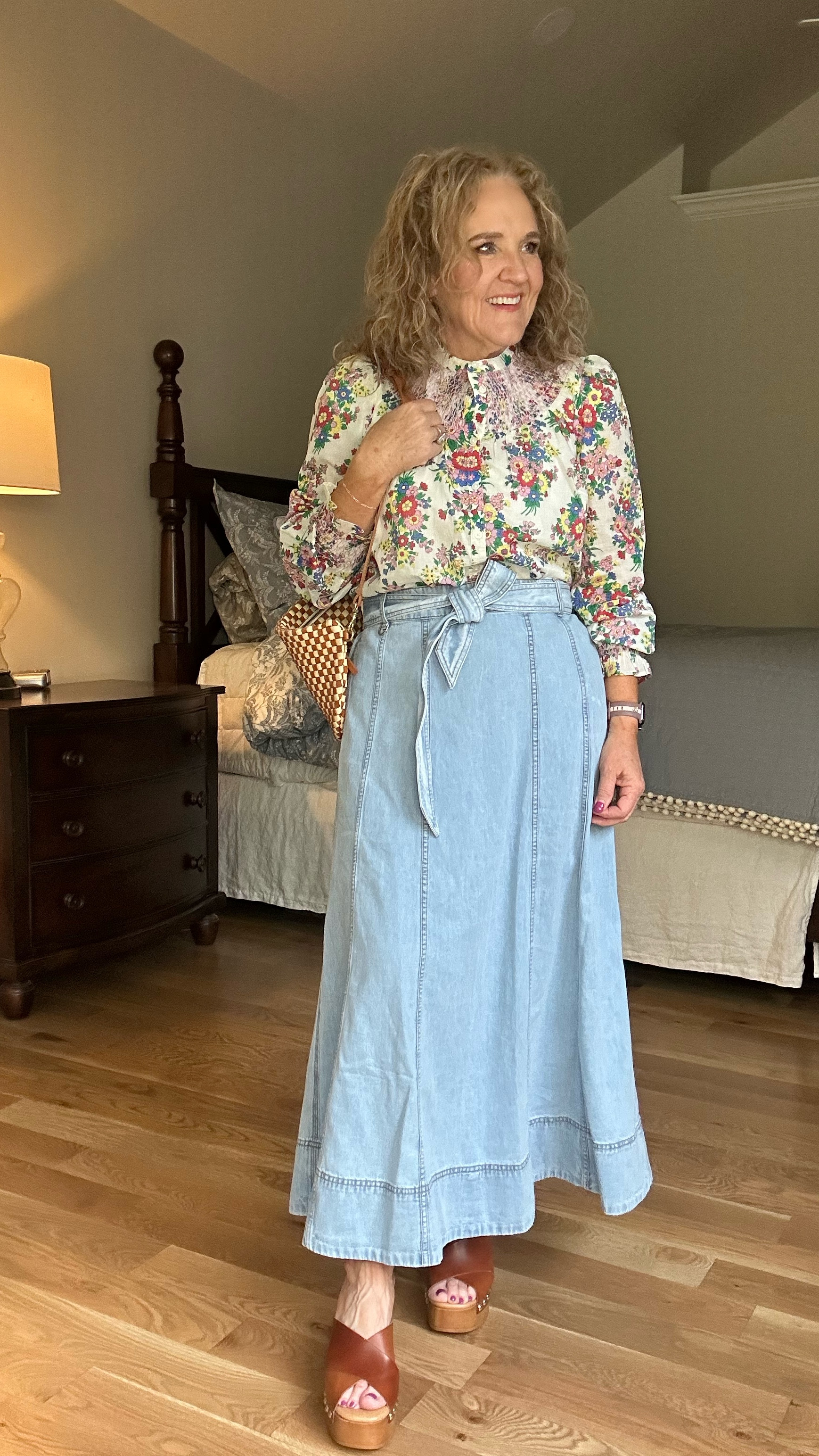 A little 70s boho and I love it. 
Blouse comes in another print too that’s almost fully stocked. It’s beautiful. Wearing size 8  
Skirt is by loft. It’s such a nice soft denim. Wearing size medium petite 

#LTKOver40 #LTKWatchNow #LTKSaleAlert