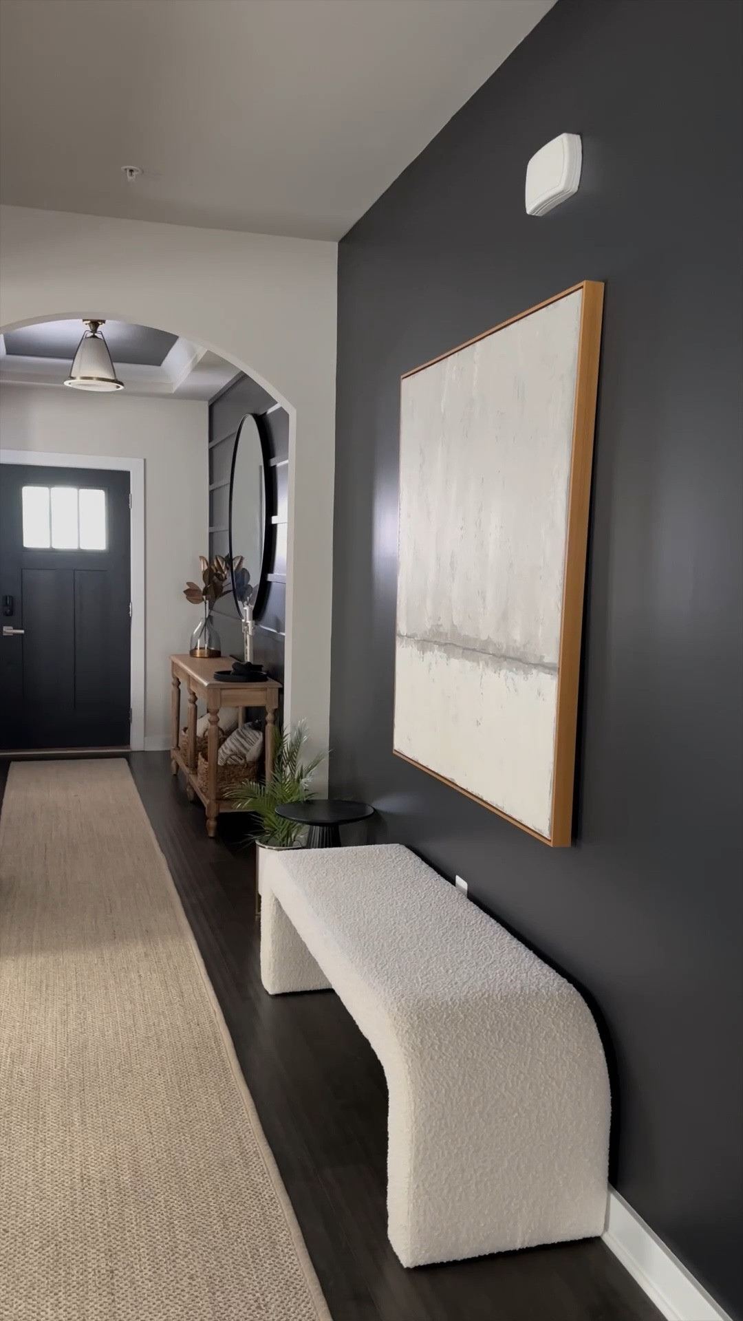 Creating drama in your home is about styling a space that feels bold and impactful. We decided to extend the moody accent wall in the entryway and paint our main-level doors black. 

I love how the moody walls and doors shake things up and catch the eye. The contrast also makes the light walls look even brighter 🤗. 

#LTKVideo #LTKStyleTip #LTKHome