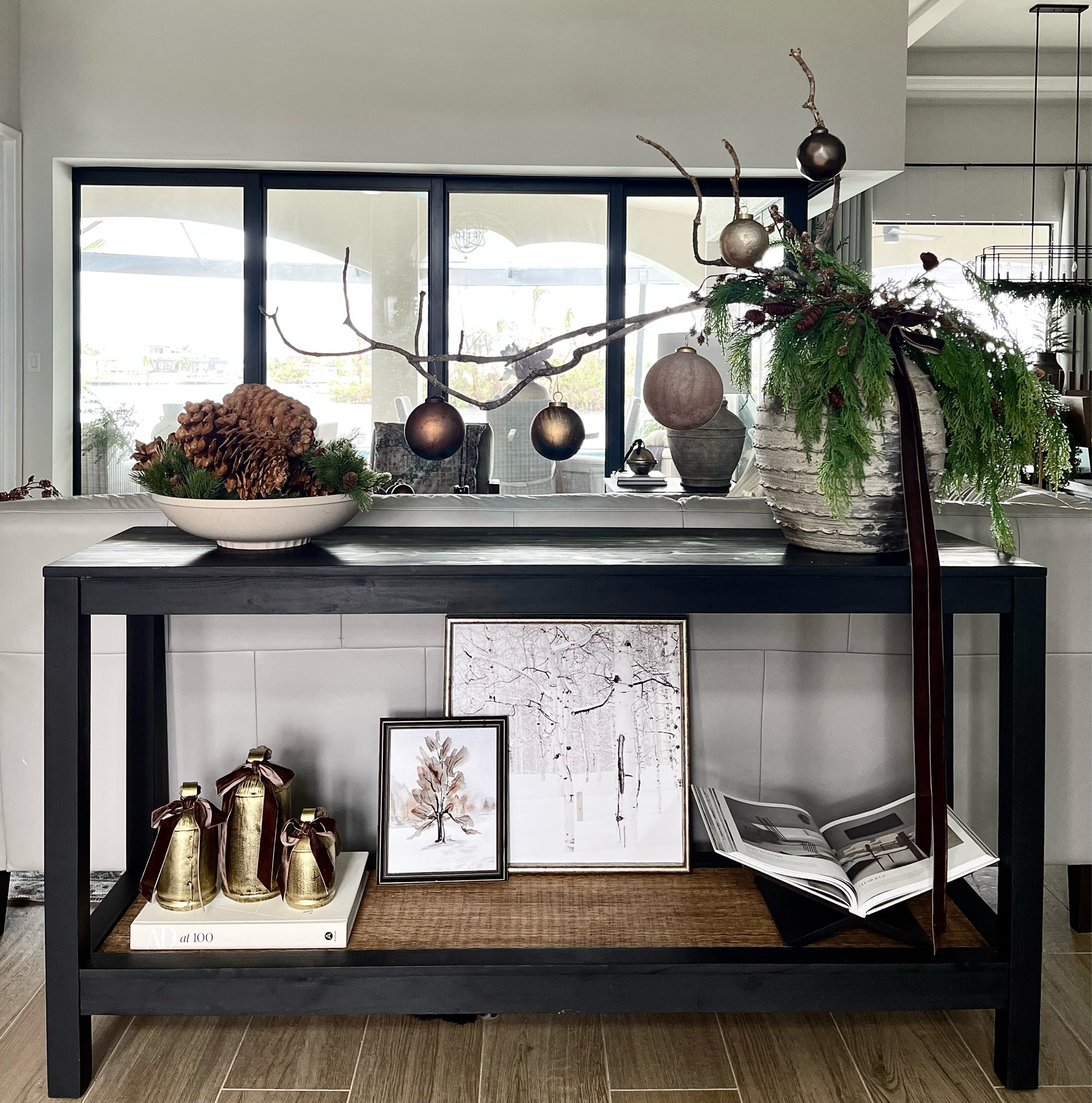 Console Table Decor
Tan bowl, large pinecones, pottery barn vase, cedar stems, velvet ribbon, ornaments, gold cow bells, winter prints, book holder
#collectionprints #founditonamazon

#LTKHoliday #LTKhome #LTKSeasonal