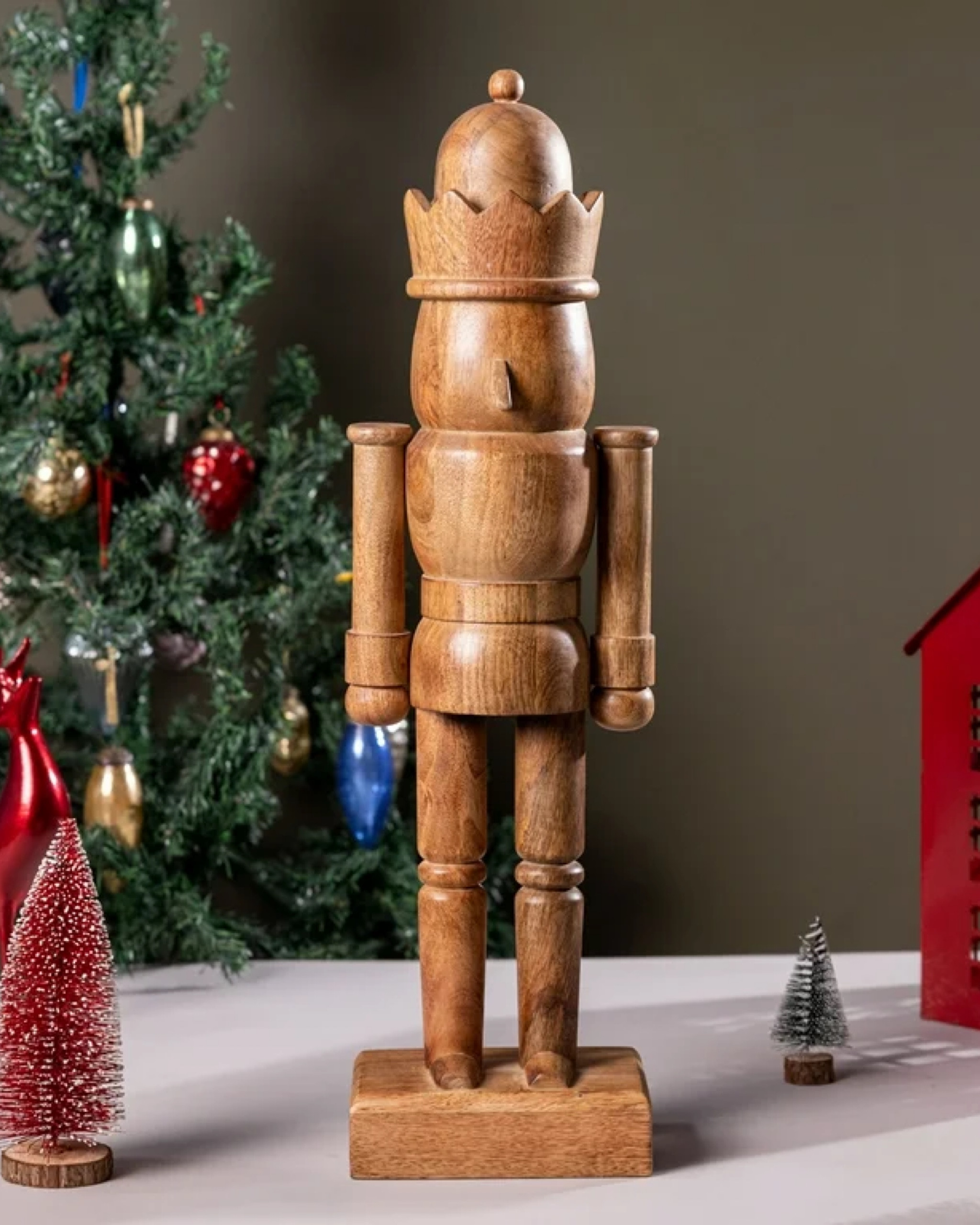 This 25-inch Holiday Time Natural Wood Nutcracker, crafted from natural mango wood, is a charming and timeless addition to your holiday decorations. Its classic design, paired with the warmth and beauty of natural wood grain, adds a rustic yet elegant touch to your seasonal display. Perfect for placing on a mantel, entryway table, or as part of a festive vignette, this nutcracker brings a traditional holiday feel to any room, making it a standout piece in your Christmas decor collection.

#LTKHoliday #LTKSeasonal #LTKHome