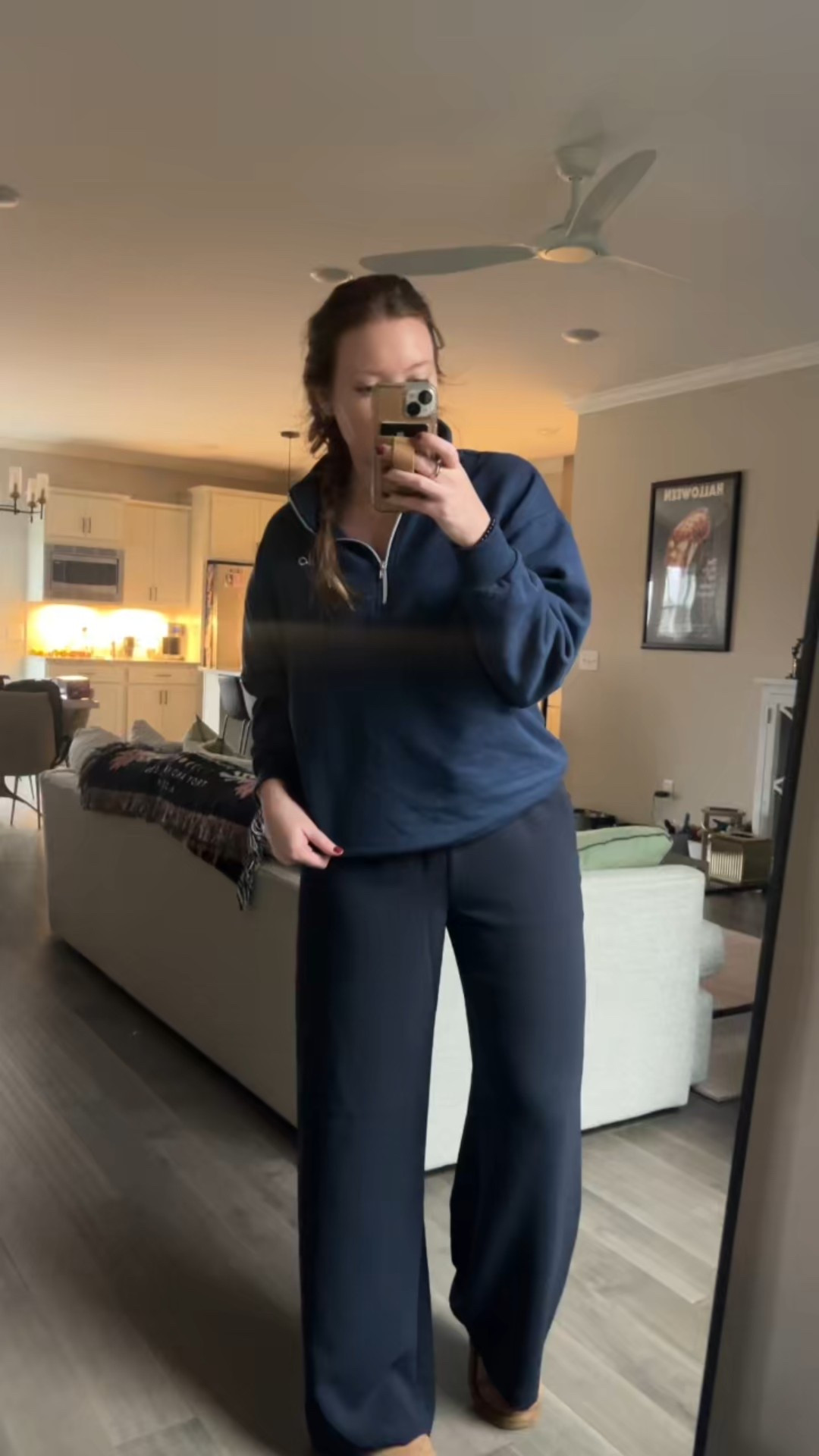 Navy half zip sweatshirt / tts wearing a medium 
Navy Lodge Pant / tts wearing a medium 
Uggs 
Work travel outfit 

#LTKWorkwear #LTKootd #LTKTravel