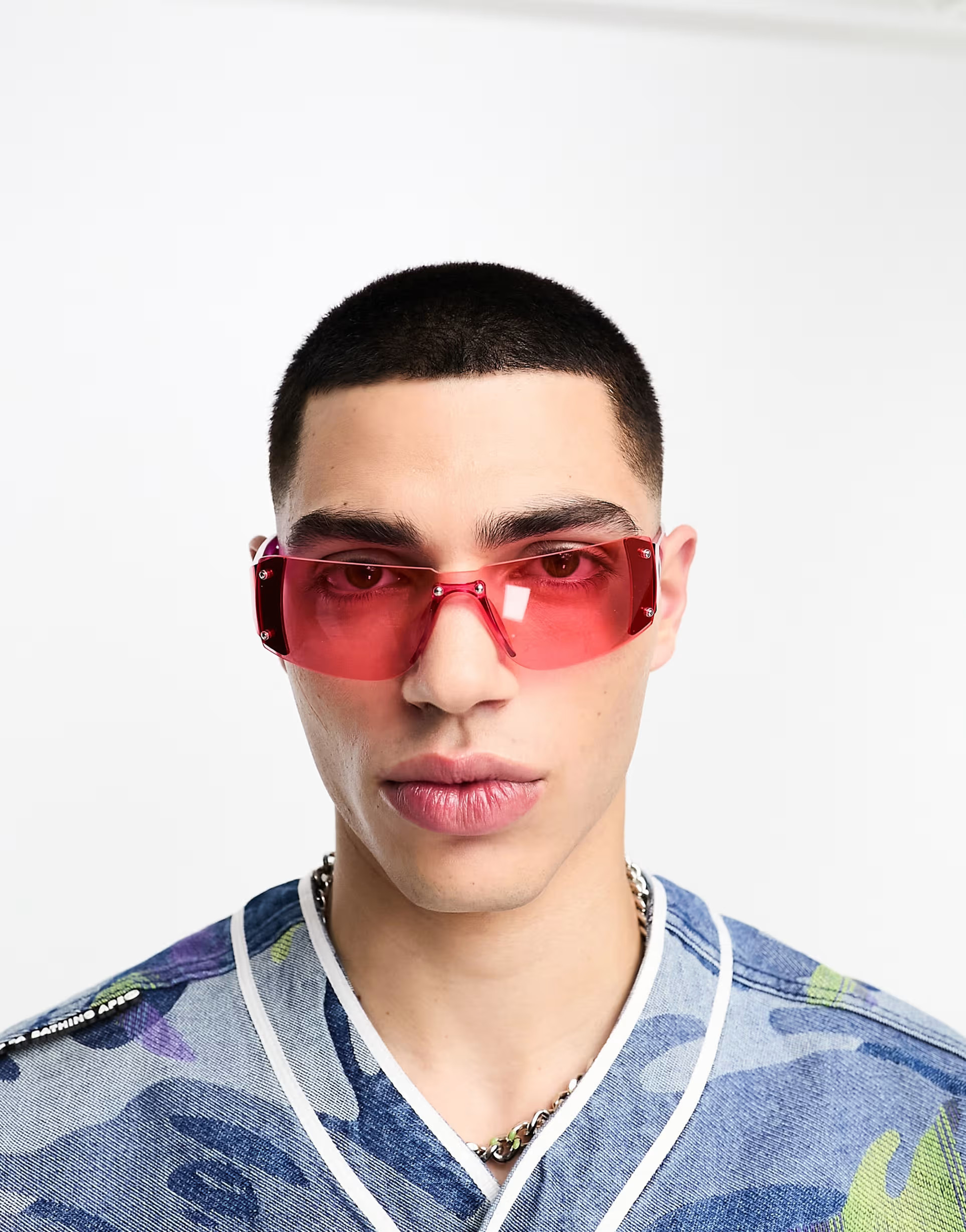 ASOS DESIGN rimless visor sunglasses with stud detail in crystal pink | ASOS (Global)