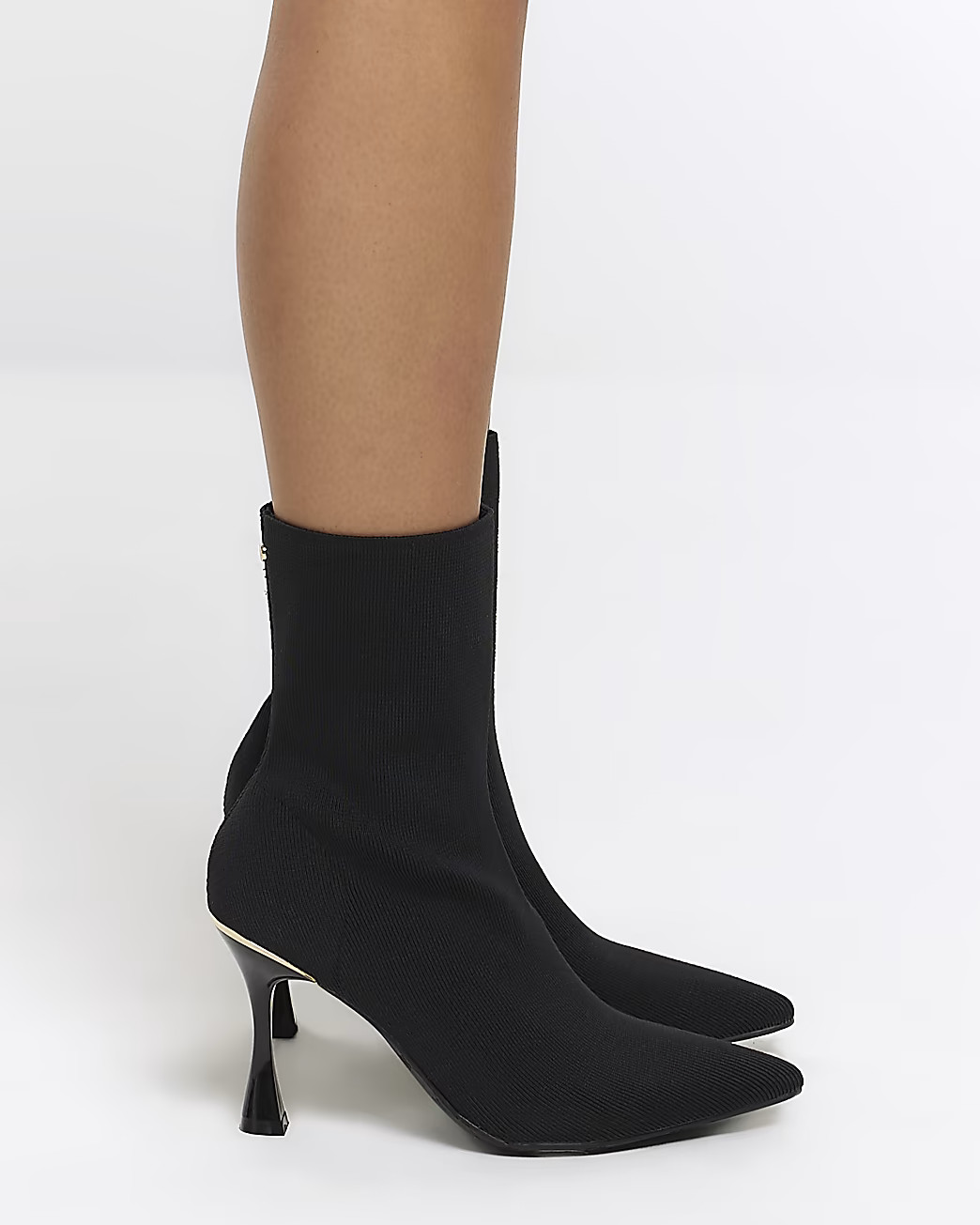 Black knitted heeled ankle boots | River Island (UK & IE)