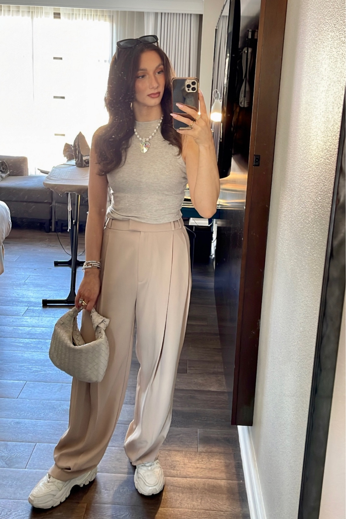 Vacation SC 
Monochromatic look
Neutral browns
Trousers, sneakers, tank

#LTKitbag #LTKstyletip #LTKSeasonal