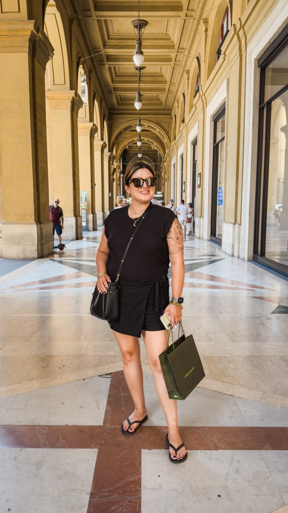 Florence exploring outfit:
AE top (XL)
Open Edit skort (L)
Archies flip flops 
Tory Burch bag 

#LTKOver40 #LTKTravel #LTKMidsize