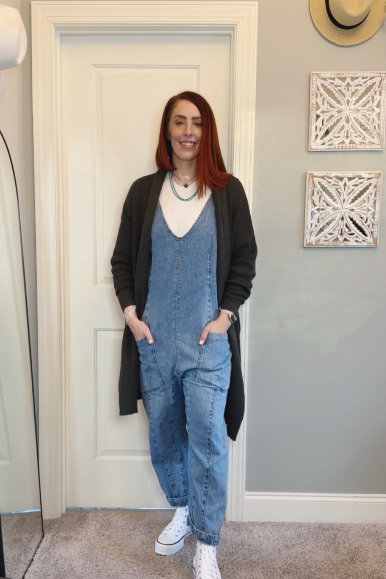 This cozy boho look was built entirely from pieces I already own (no shopping required!). I’m wearing a forest green duster cardigan that’s giving all the wintery feels, layered over a cream tank and a Free People-inspired jumpsuit. Finished it off with my new high-top Converse for that casual-cool touch.

Perfect for a work-from-home day where comfort and style actually meet. Who says January has to be drab when you’ve got layers to play with?

What’s your go-to layering piece in winter?

#LayeredLuxe #BohoWinterStyle #BohoChicVibes

#LTKFindsUnder100 #LTKShoeCrush #LTKStyleTip