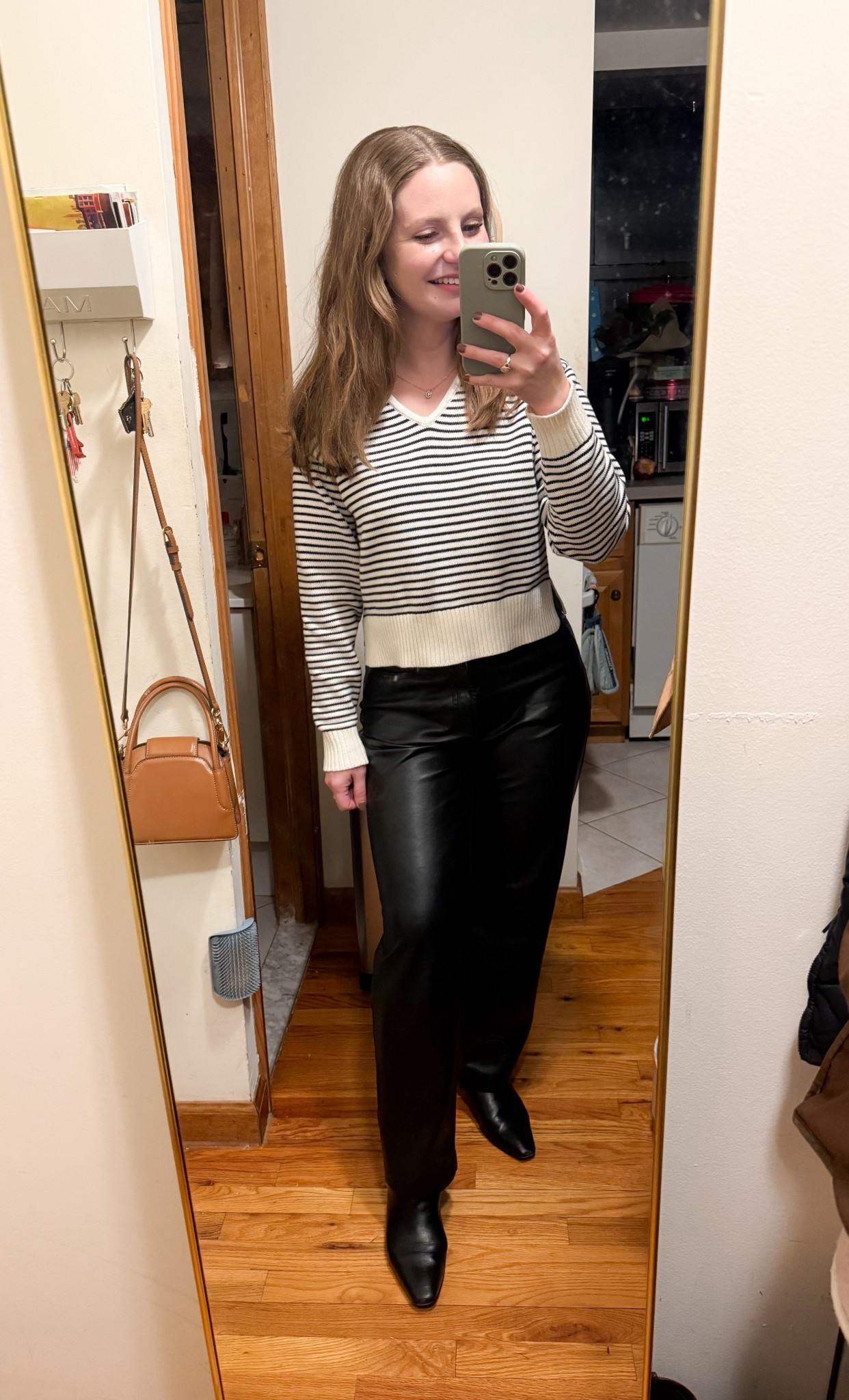 This sweater is the perfect length and shape. So good! Paired it with black leather straight leg pants for work today. 

#LTKootd #LTKdayinmylife