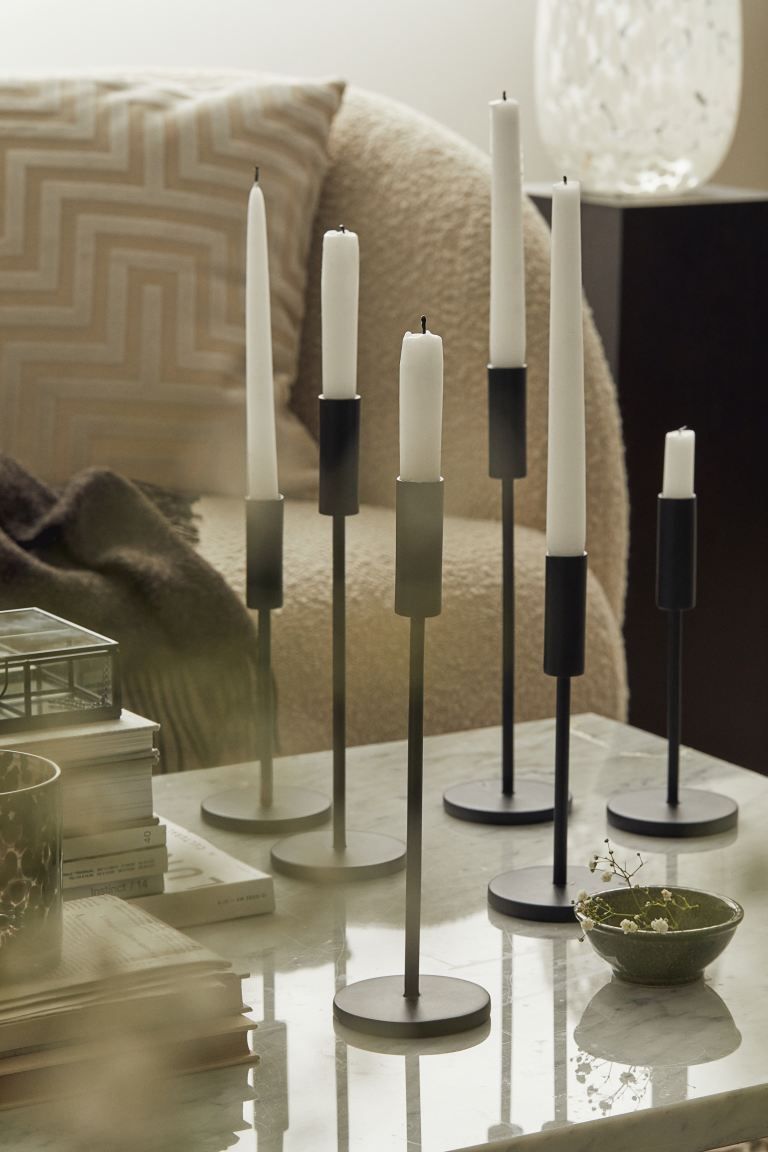 Tall metal candlestick with a round base. Height 11 3/4 in.CompositionMetal 100%Art. No.065997500... | H&M (US + CA)