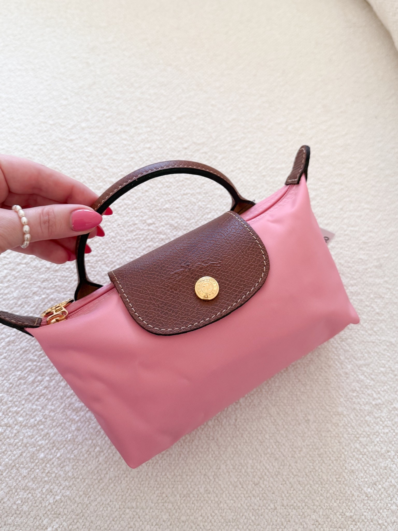 The cutest little spring bag for spring! Linking the strap I use with these mini bags to make it a crossbody 🤍

#LTKItBag #LTKSeasonal #LTKFindsUnder100
