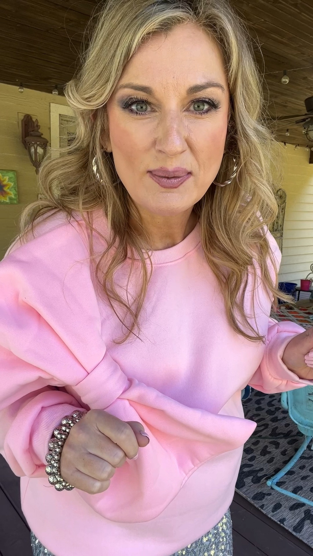 Pink bow sweatshirt.  Wearing g a large true to size.  Sequin skirt 

#LTKStyleTip #LTKOver40 #LTKMidsize