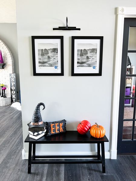 A little too obsessed with this light to wait till my pictures get delivered. 🤣 This little area is finally coming together! 🖤#LTKHalloween

Entryway bench. Amazon. Amazon bench. Battery operated light. 

#LTKhome #LTKunder50