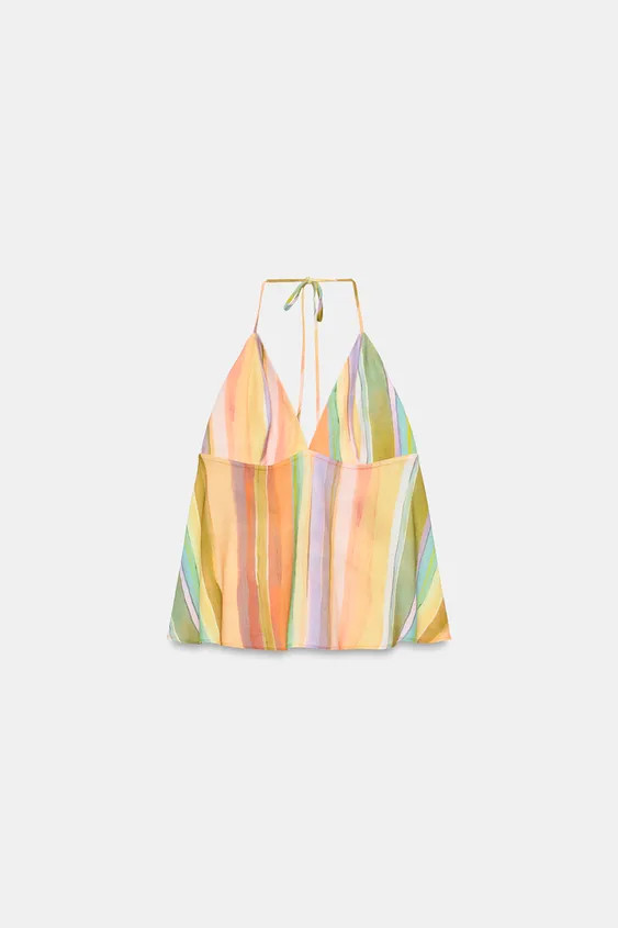 Model height: 179 cmHalter neck top with a V-neckline and open back. Back fastening with bows. | Zara UK