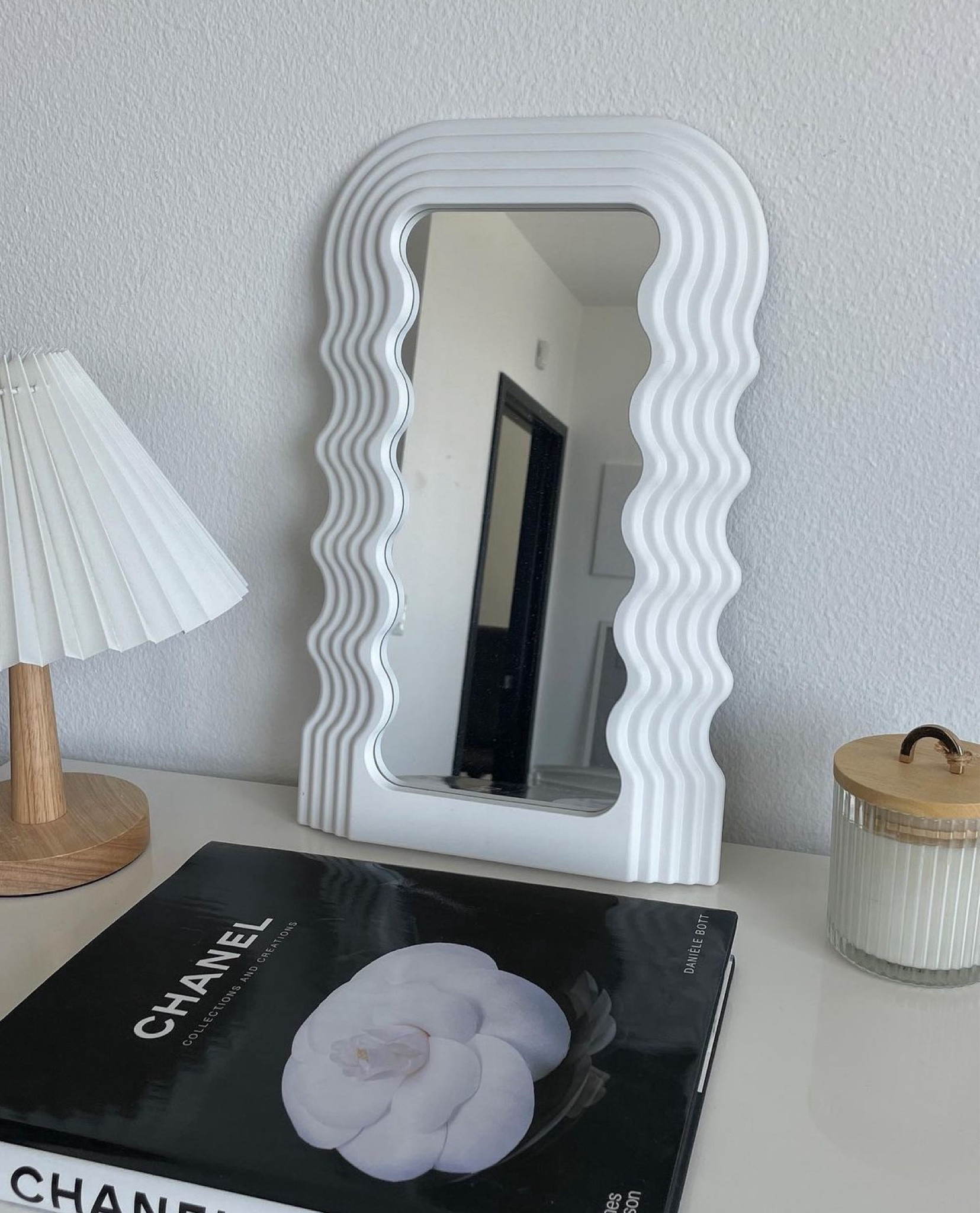 Home decor from Amazon❤️ 
Favorite wavy mirror and Chanel table book

#LTKFindsUnder50 #LTKHome #LTKFindsUnder100