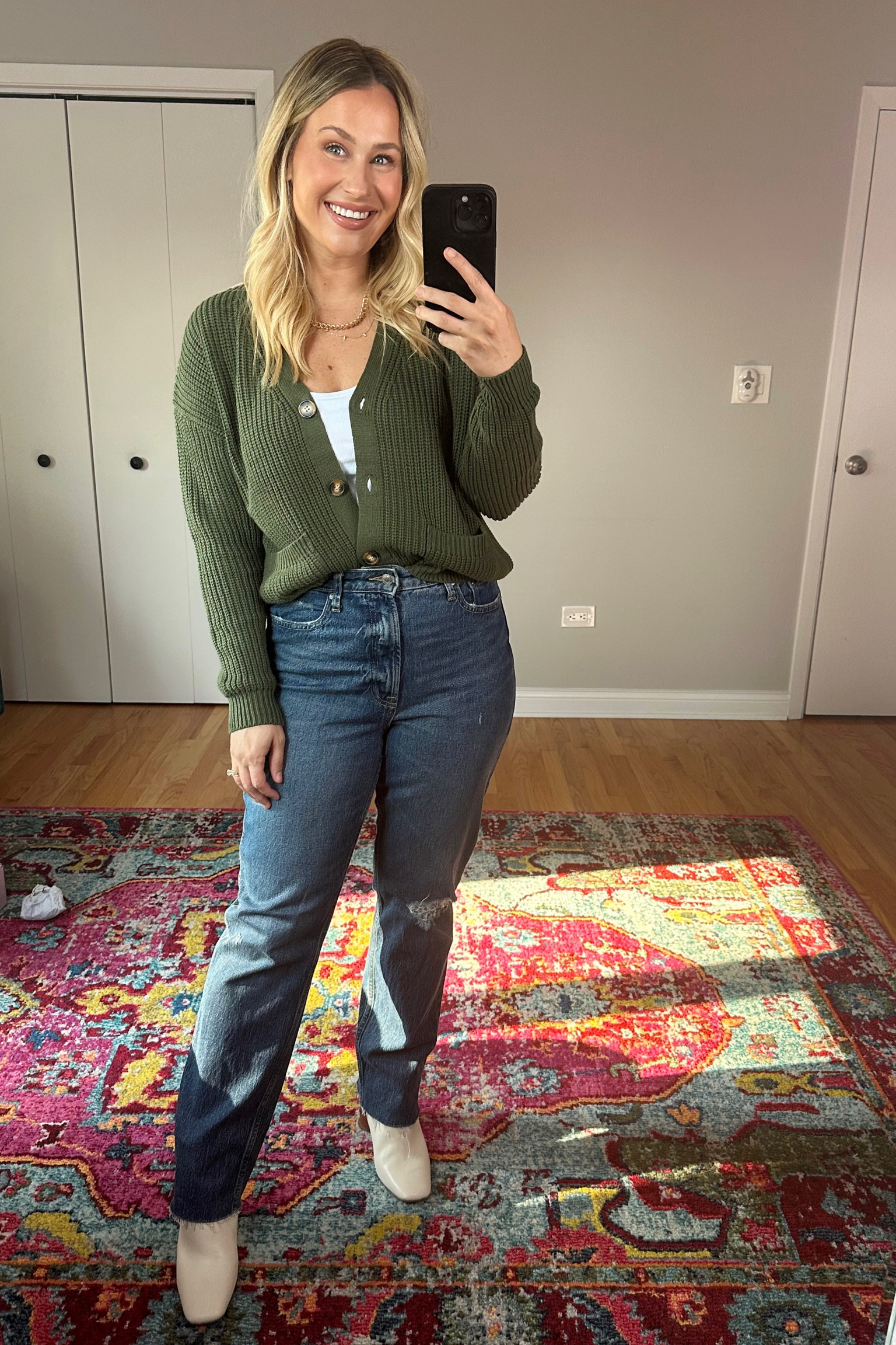 Casual fall outfit idea / straight jeans, booties, cardigan, necklaces and white tank top are all under $40! #falloutfit 

#LTKstyletip #LTKshoecrush #LTKunder50