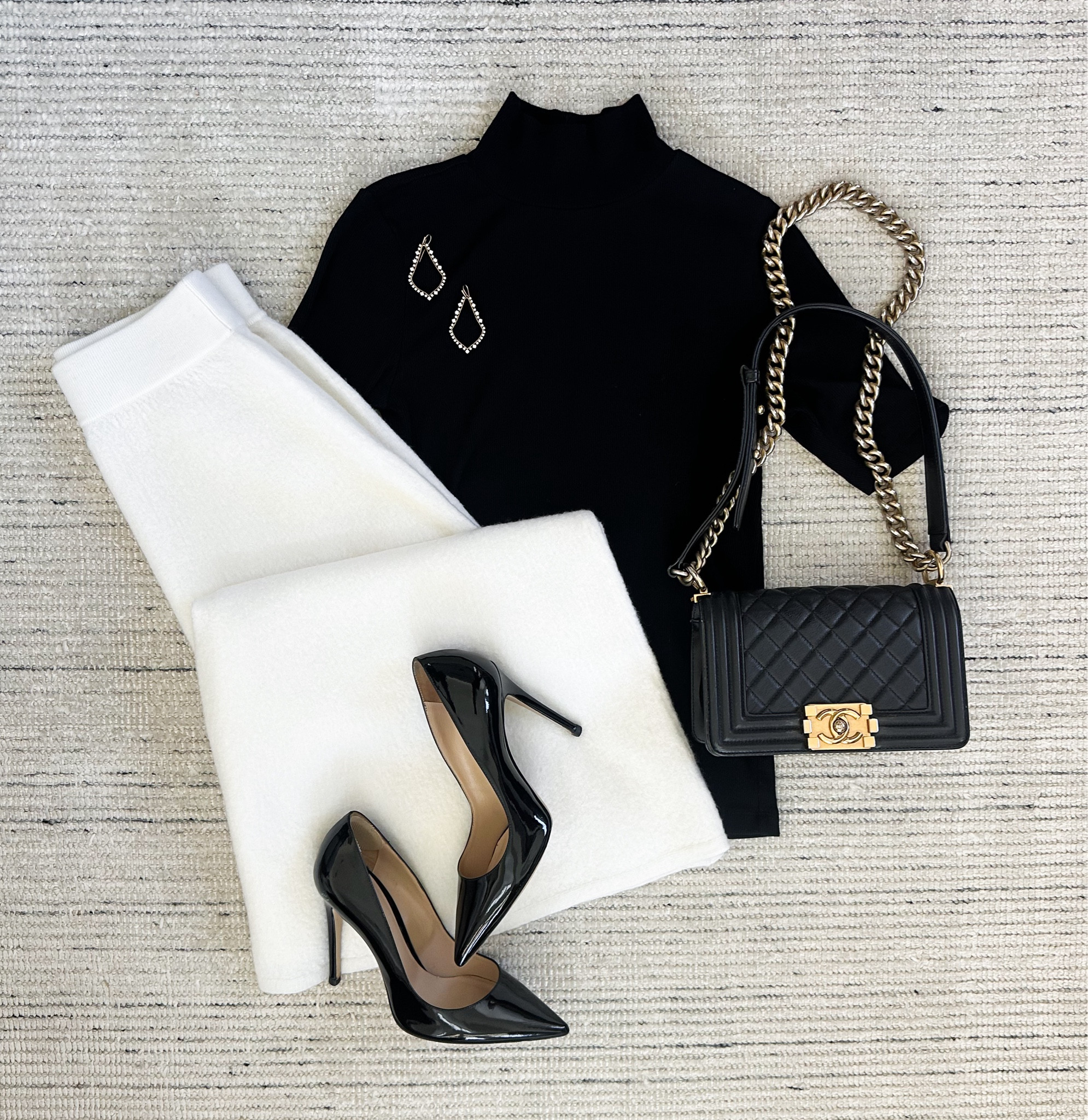 Fall and winter workwear with cream midi skirt and black mock neck top paired with pumps for a chic look. Pair with a coat to keep you warmer! 

#LTKStyleTip #LTKSeasonal #LTKWorkwear