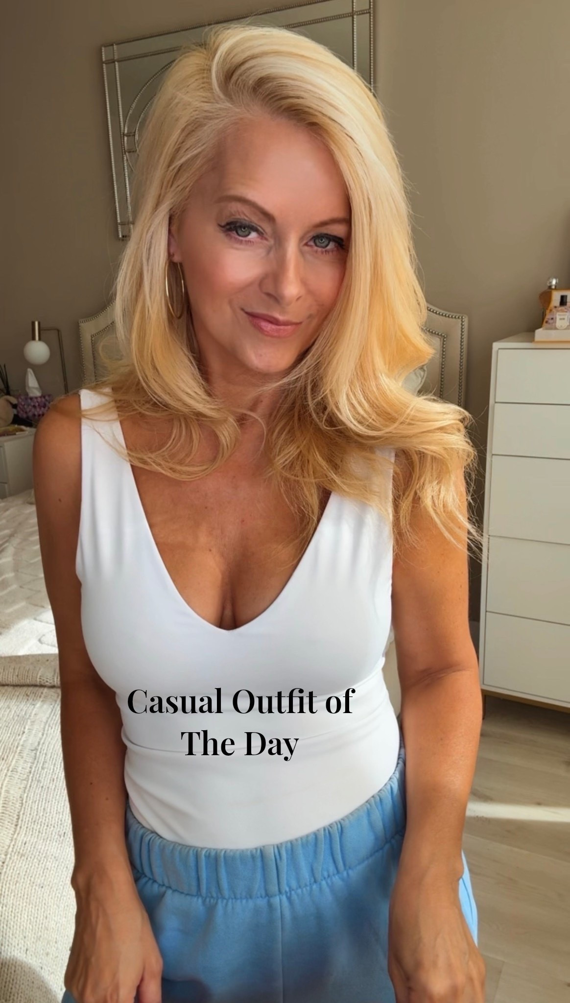 Cute casual outfit of the day! 
White v-neck contour tank top and blue joggers