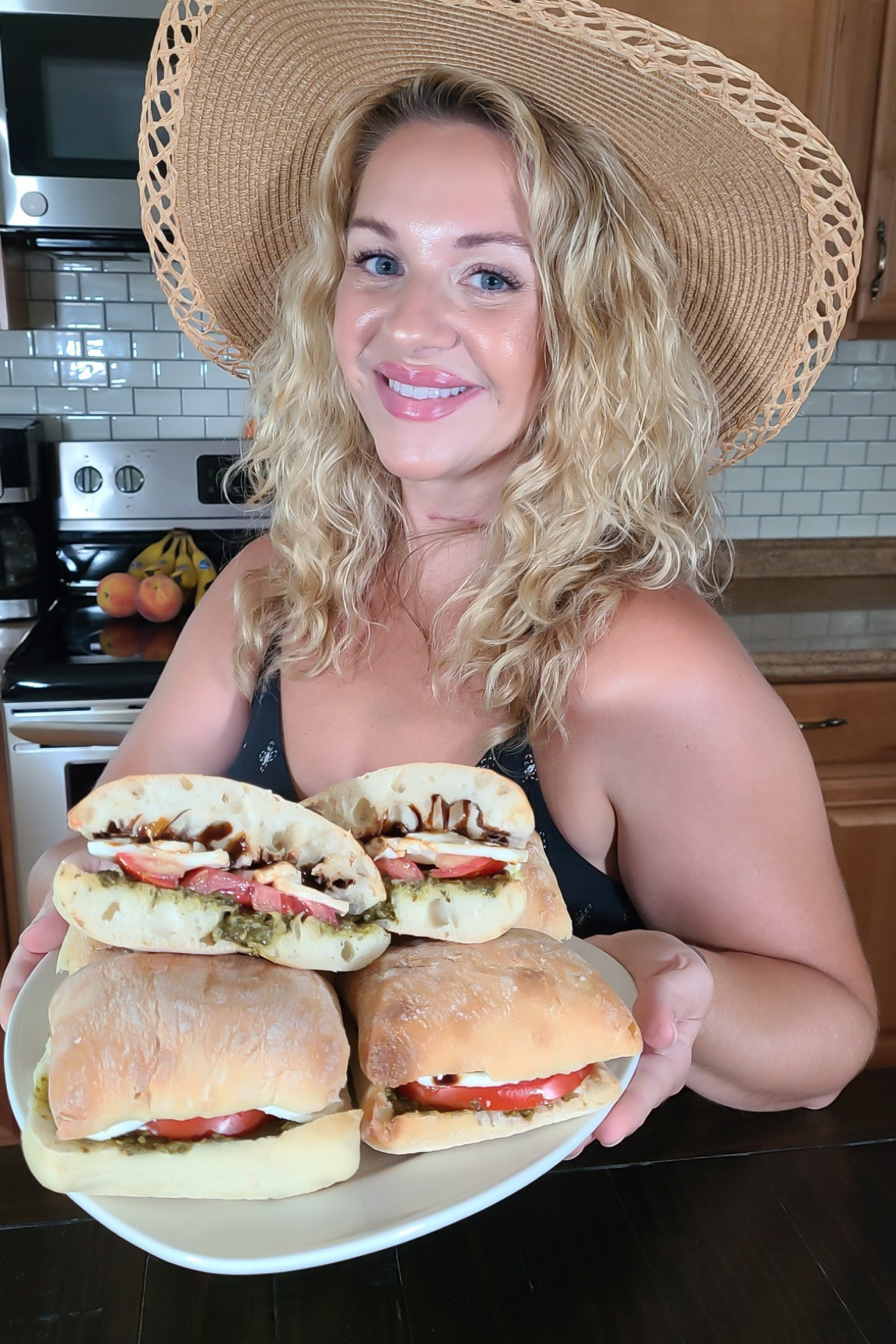 🍅 Growing up in South Jersey, tomato sandwiches are a staple. Over the years, I’ve concocted my own version though, because I’m not a fan of mayo! 
▪️On one half of the ciabatta, spread pesto. Then layer tomato (salt & pepper) and mozzarella.
On the other half of ciabatta drizzle balsamic reduction. Enjoy these Jersey Girl sandwiches! The full reel is on IG. 