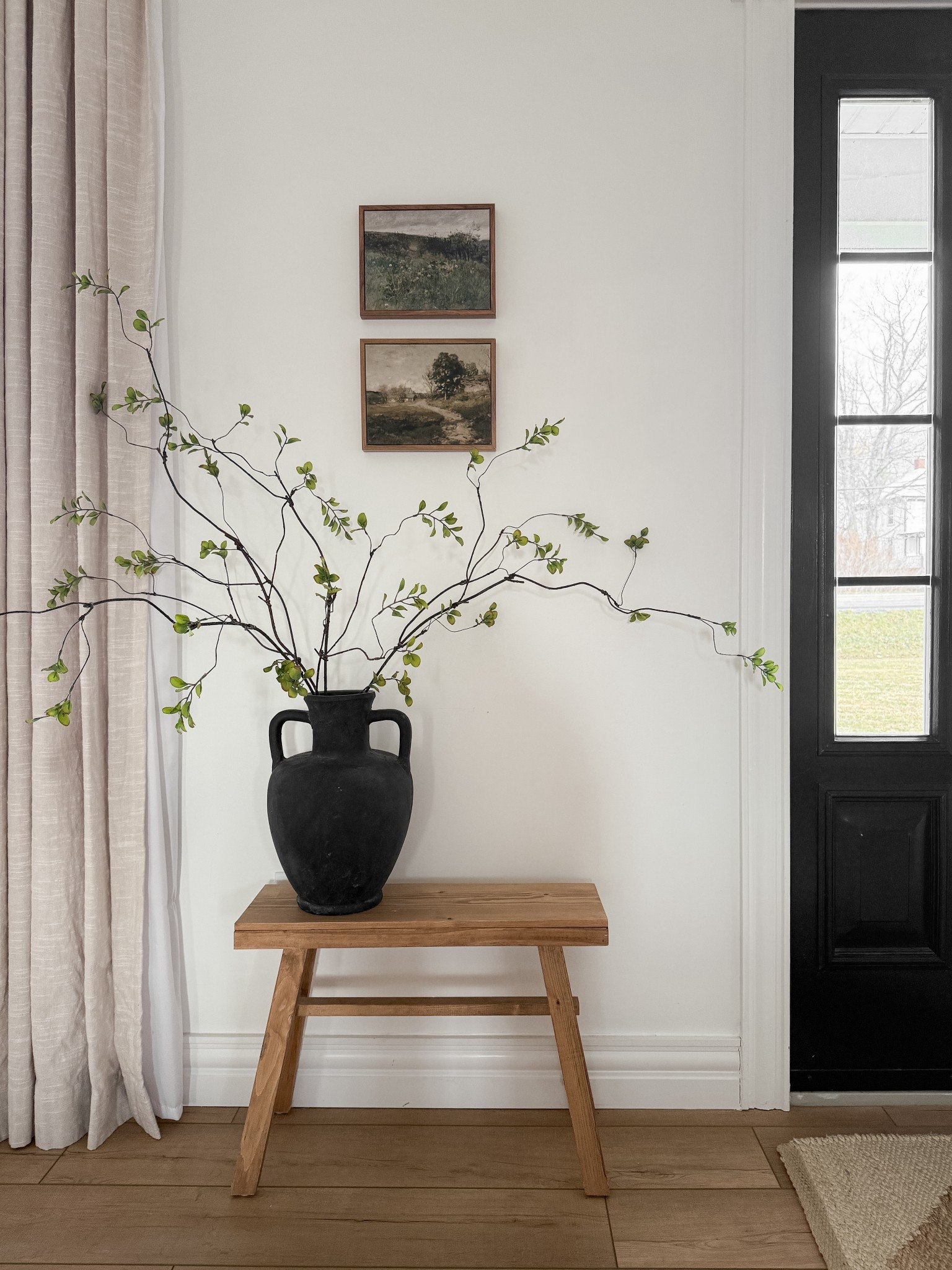 An entryway doesn’t need much.
A simple stool, an airy vase with stems, and my favorite Amazon framed art— easy, neutral, and lived in 🤎🤎

#LTKsale #LTKcanada #LTKhome