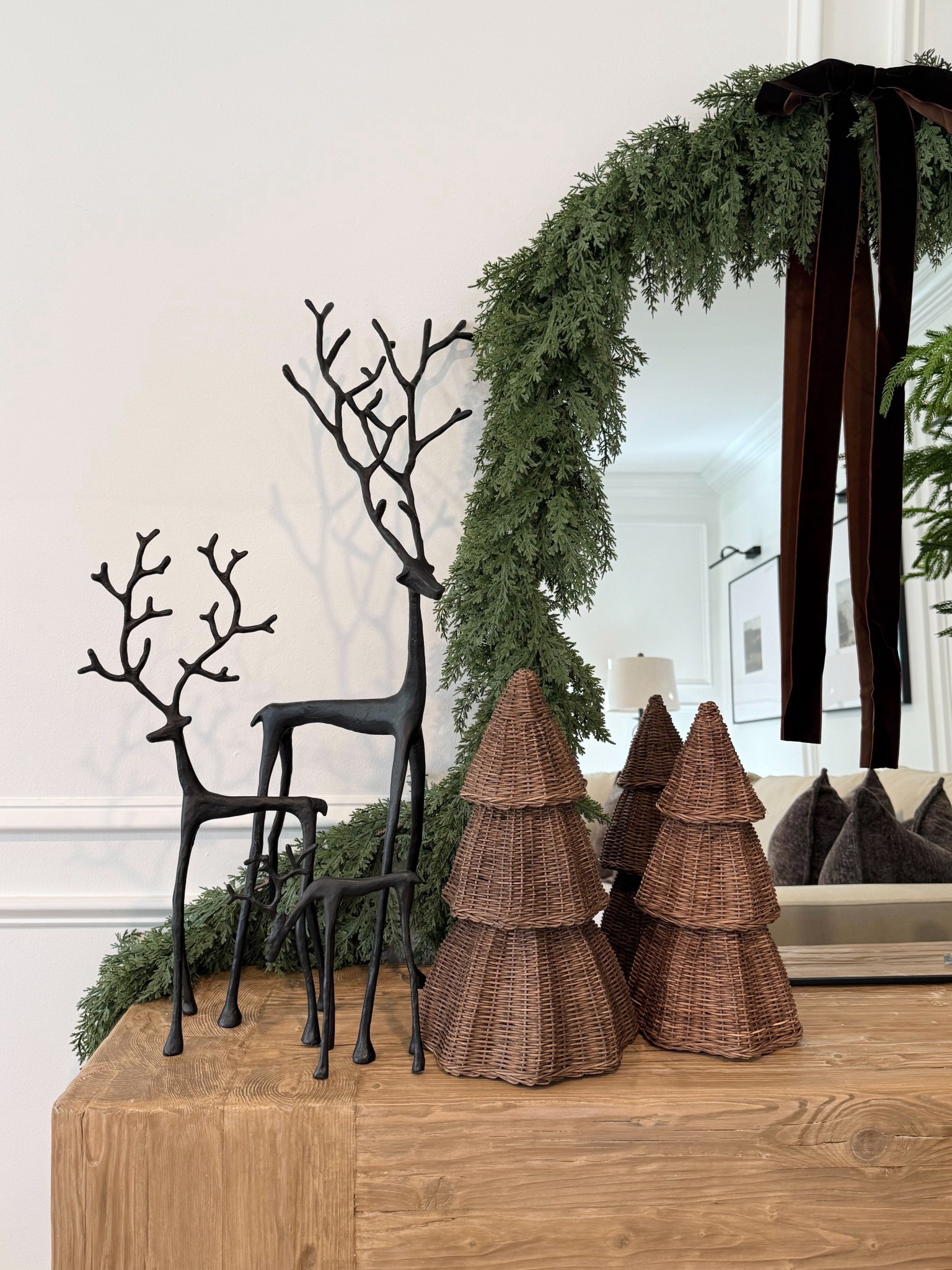 Just a snippet of what I’ve been working on for this season’s Christmas decor! 🖤

I started decorating in my living room today. I used this realistic 9 ft cedar garland on my arched mirror. I couldn’t resist adding this large brown bow! I love styling my rustic console table for the holidays. A personal favorite of mine are these viral metal reindeer. These are about three years old, so I linked the current version from Pottery Barn and similar versions for you to choose from. These brown rattan Christmas trees (in medium & large) are a new addition this year. 🤎🖤 Stay stunned for more new holiday content coming soon. 


#LTKSeasonal #LTKSaleAlert #LTKHome