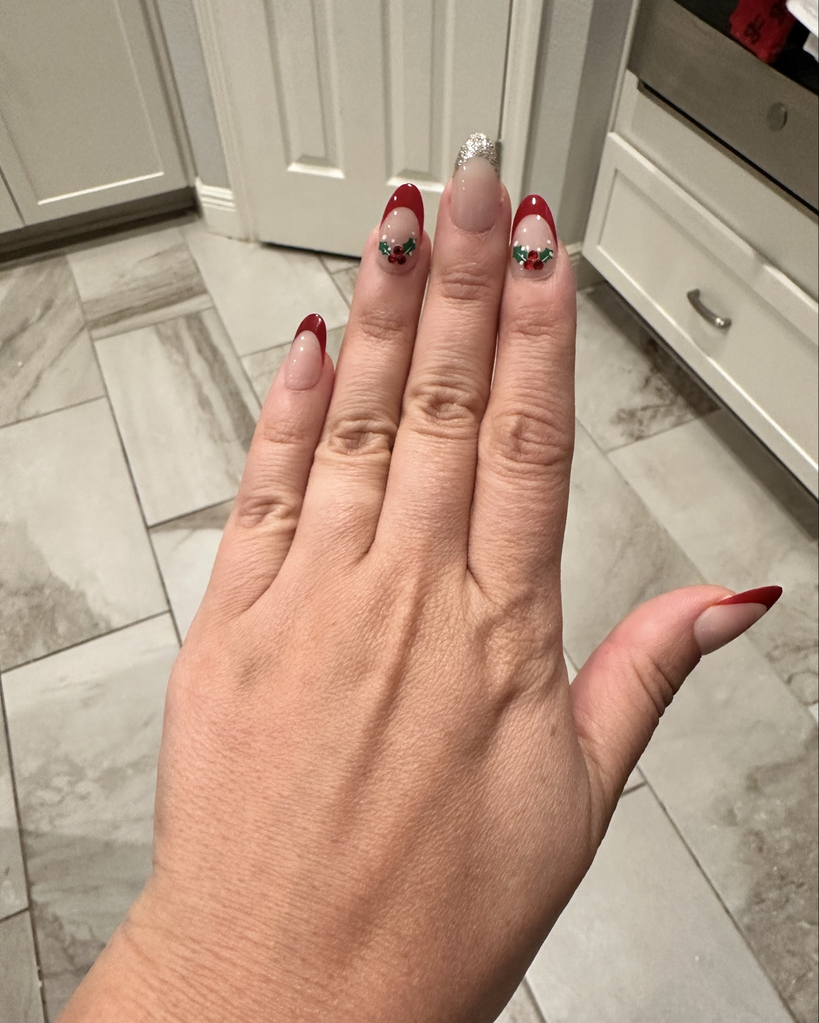 Press on Christmas nails 💅 This is the best brand! The only brand that I haven’t had trouble with them popping off. Myself and my girls were these. So easy to apply yourself. 

#LTKHoliday #LTKBeauty #LTKselfcare