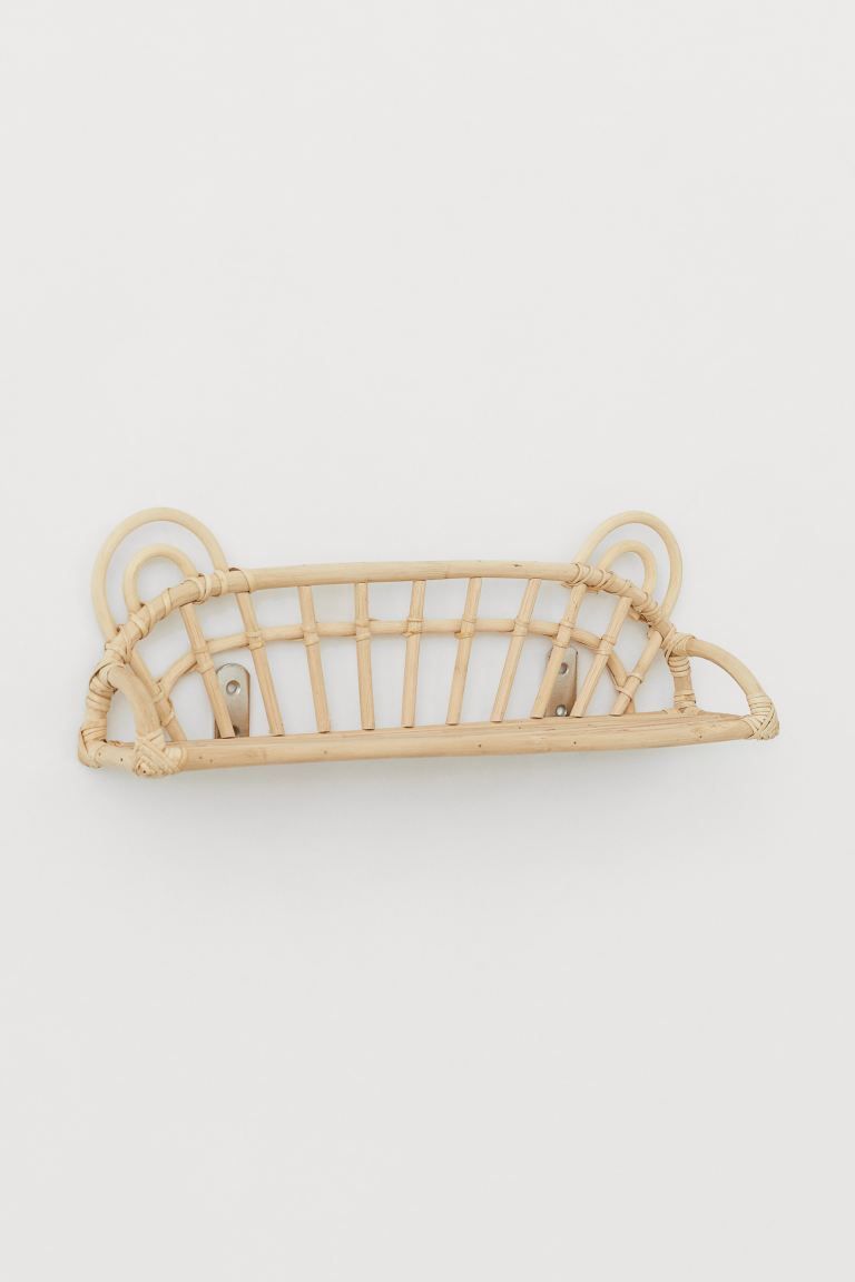 Rattan wall shelf with ears at top and metal mounting holes at back. Screws not included. Depth 3... | H&M (US + CA)