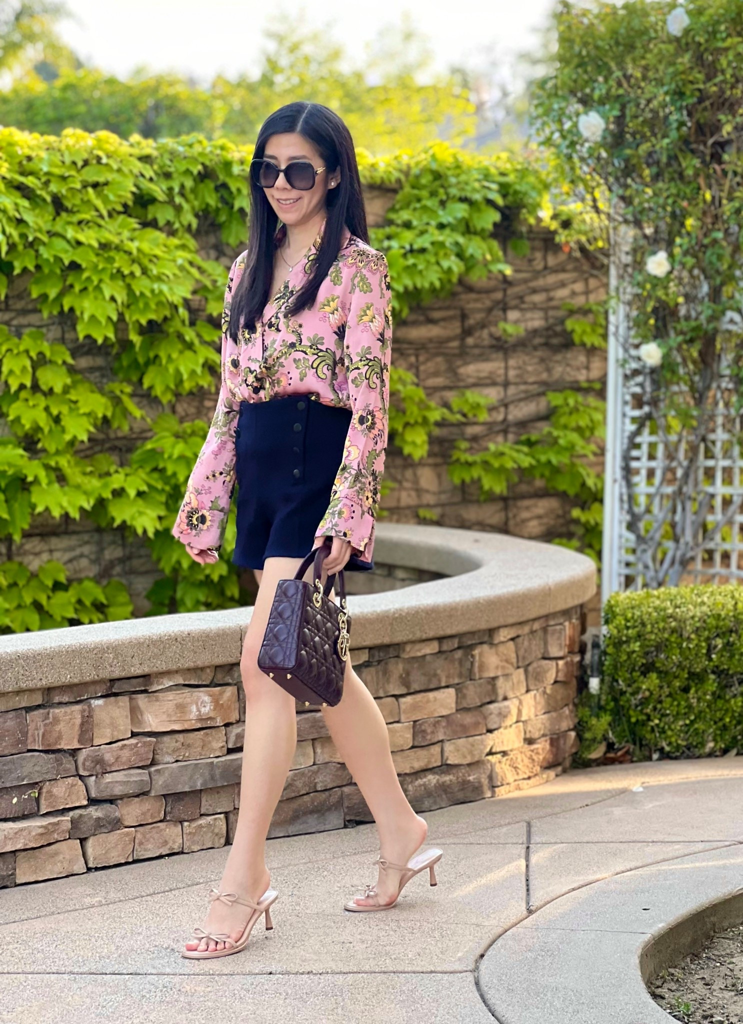 Florals for Spring may not be groundbreaking but it works! This pink flower bodysuit is one of my favorites that works both for work as it does for the weekend! I paired it with my high waisted sailor shorts and a matching bag. For my shoe selection, I wore these beige two strap bow heels. They’re not too high so they’re comfortable and what’s even better is that they’re versatile! 

#LTKItBag #LTKPetite #LTKShoeCrush