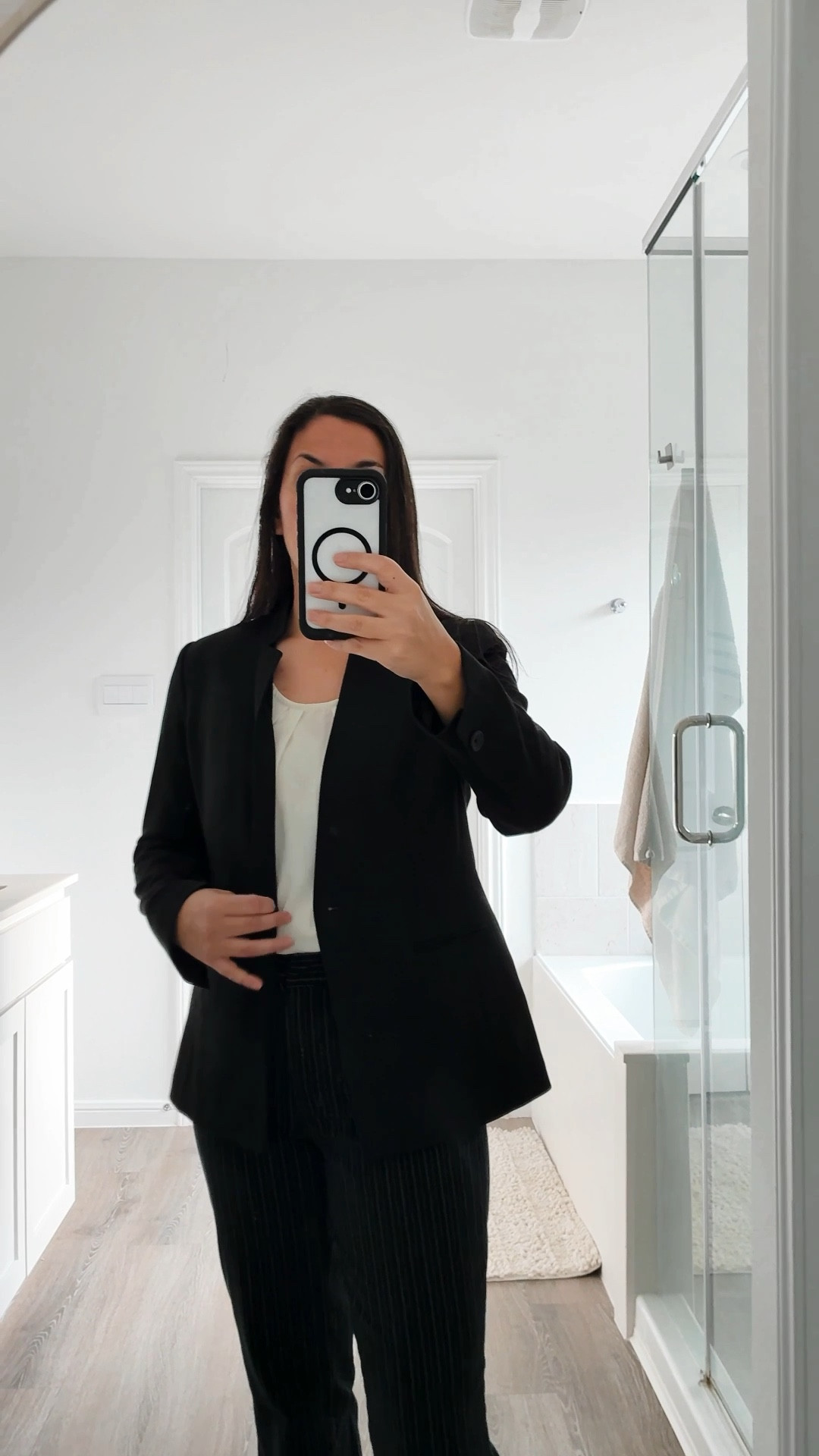 This is a classic professional work outfit. Every working woman should have a blazer that fits well and can pair with tailored slacks. These pants have pinstripes. The blouse looks nice with and without the blazer and looks good tucked in. I have shared some blouses that fit the bill since mine is not available to link. Paired with heels this really is a power/boss outfit. 

#LTKWorkwear