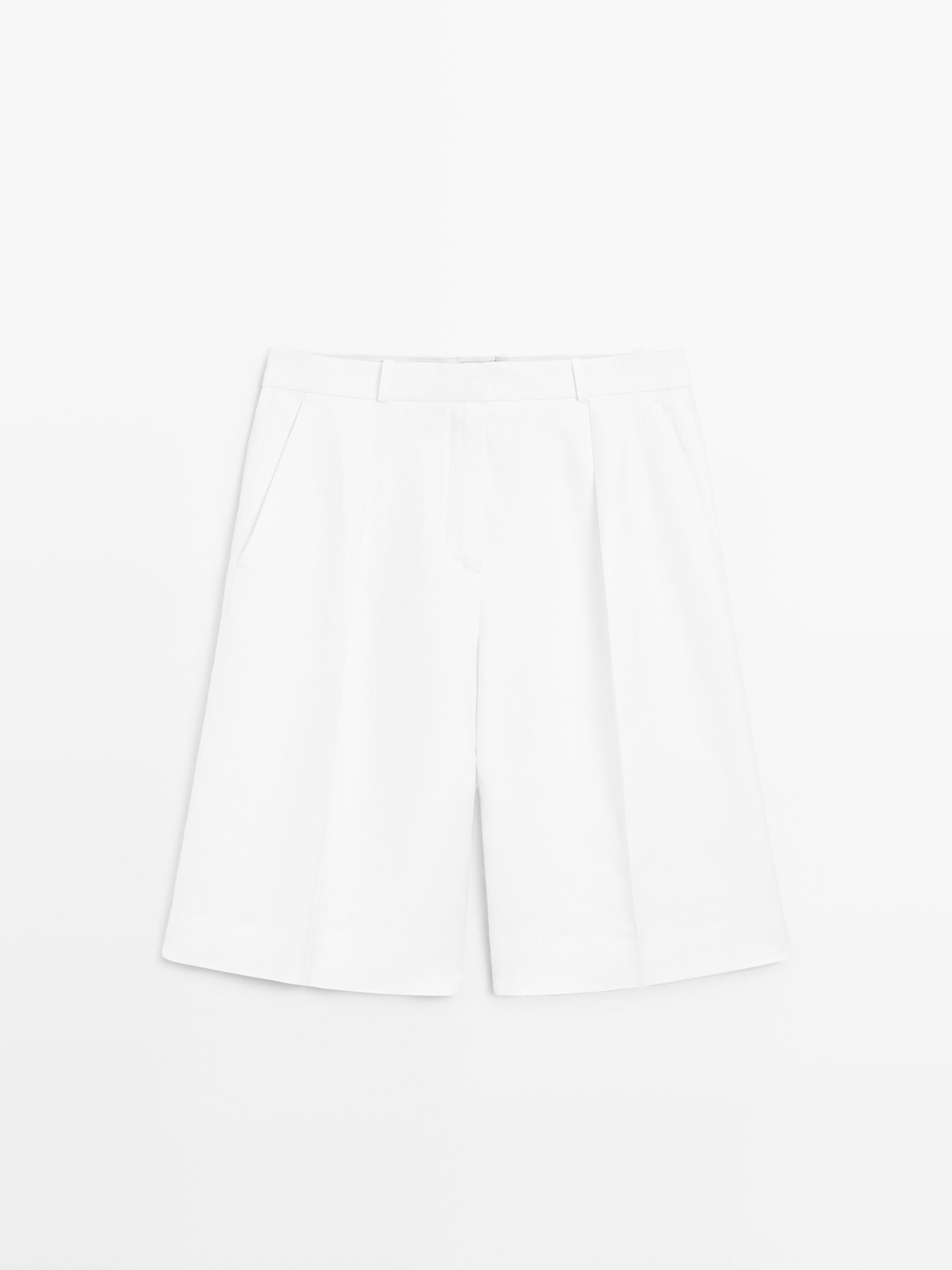 NEW VIEW LOOK
Long flowing Bermuda shorts - STUDIO

 £119  Colour:  White  Add to basket | Massimo Dutti UK