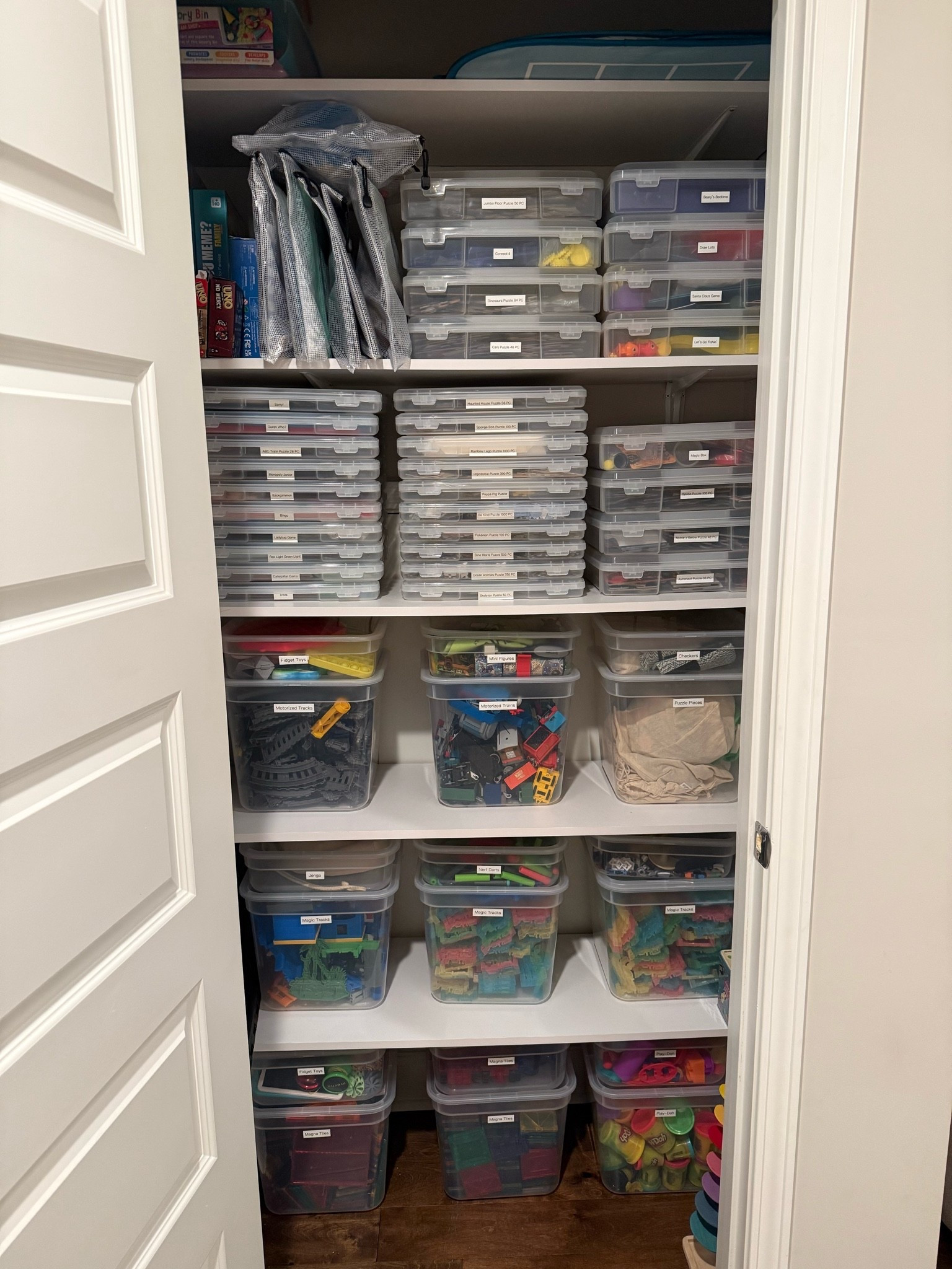 We converted this attic assess closet that was serving zero purpose into the kids new toy closet hub.

Everything is organized, labeled and super accessible for the kiddos to play with and also store back where it goes.

One of the best mom hacks to date! 

Toy storage, toy organization, toy closet, toy organization bins, toddy home