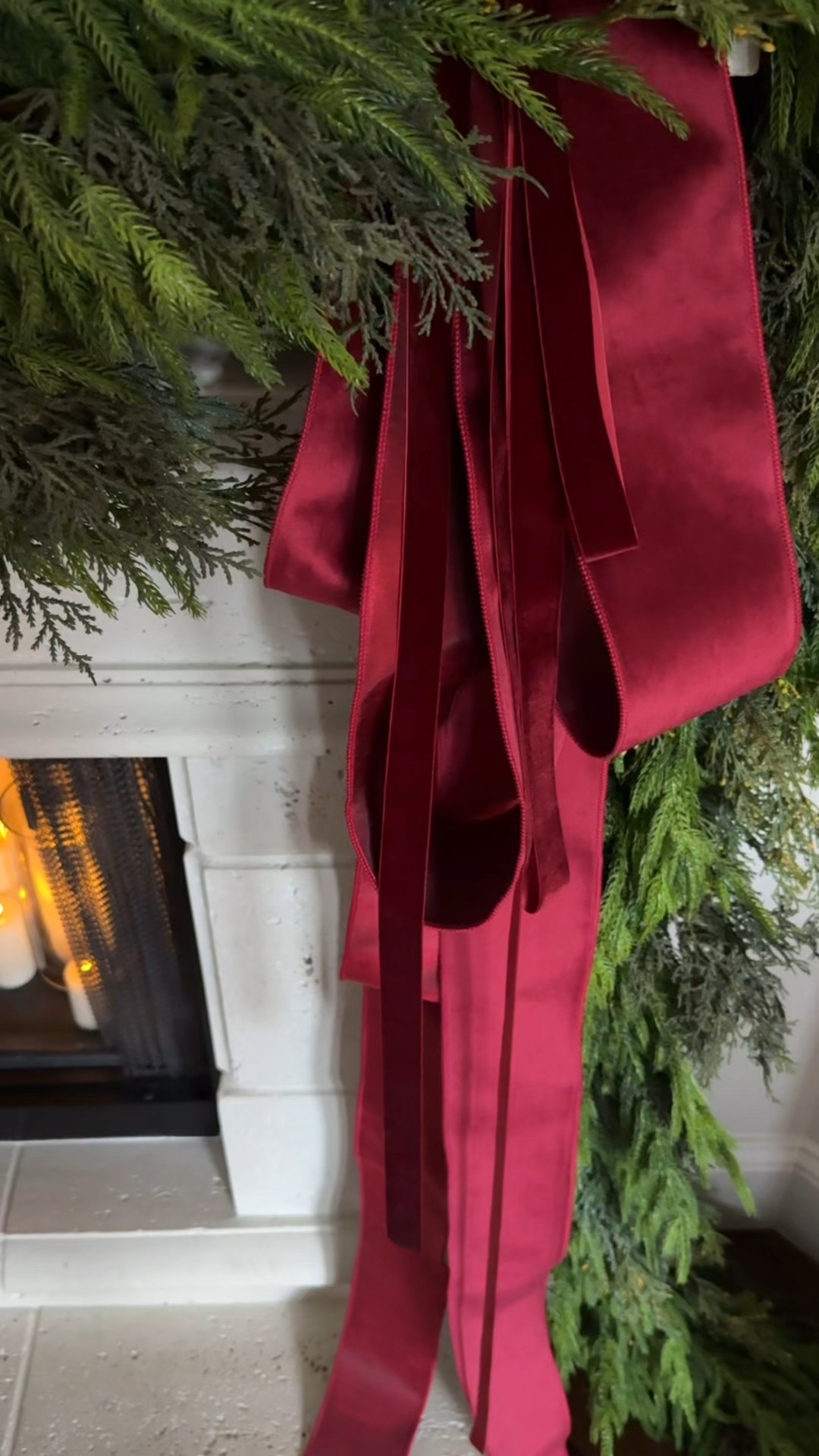 Here’s how to make the loopy velvet ribbons I have on my fireplace garland.

My garland is a mix of old cedar garland and topped with the Norfolk Pine. Most of the Norfolk pine is out of stock or takes too long to get in. I’m also linking to an incredible look-a-like that you can get in tomorrow! I’ve used it in other areas and it’s good!

Burgundy red velvet wired Christmas ribbon, Christmas fireplace decor, Christmas garland

#LTKSeasonal #LTKHoliday #LTKHome