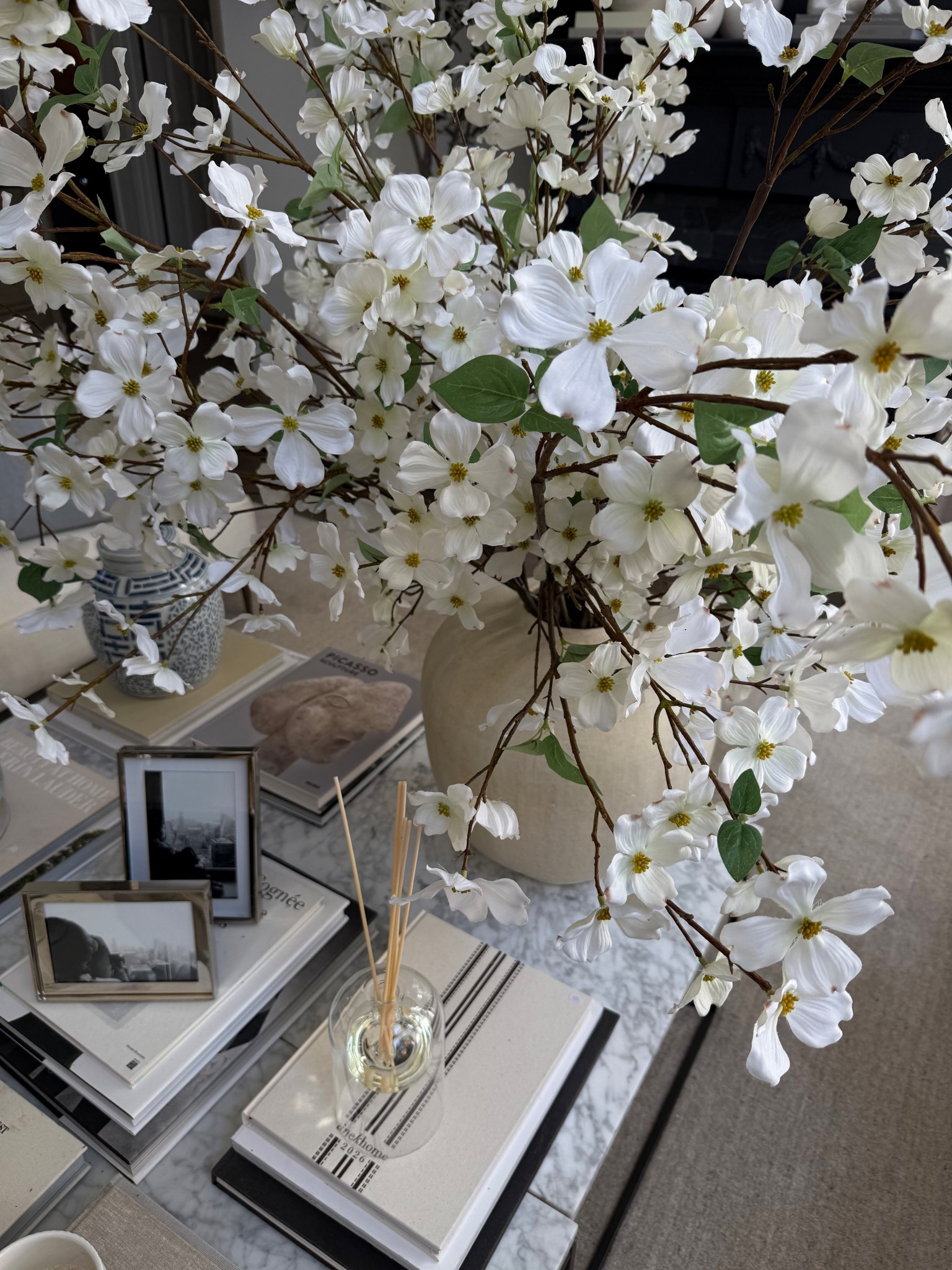 I wanted to lighten the mood in my living room this season. These are the 4 of the best things I’ve bought from pottery barn to achieve instant success: the dogwoods, the artisanal vase, the picture frames, and the best diffuser of all time!

#LTKHome #LTKSeasonal #LTKdayinmylife