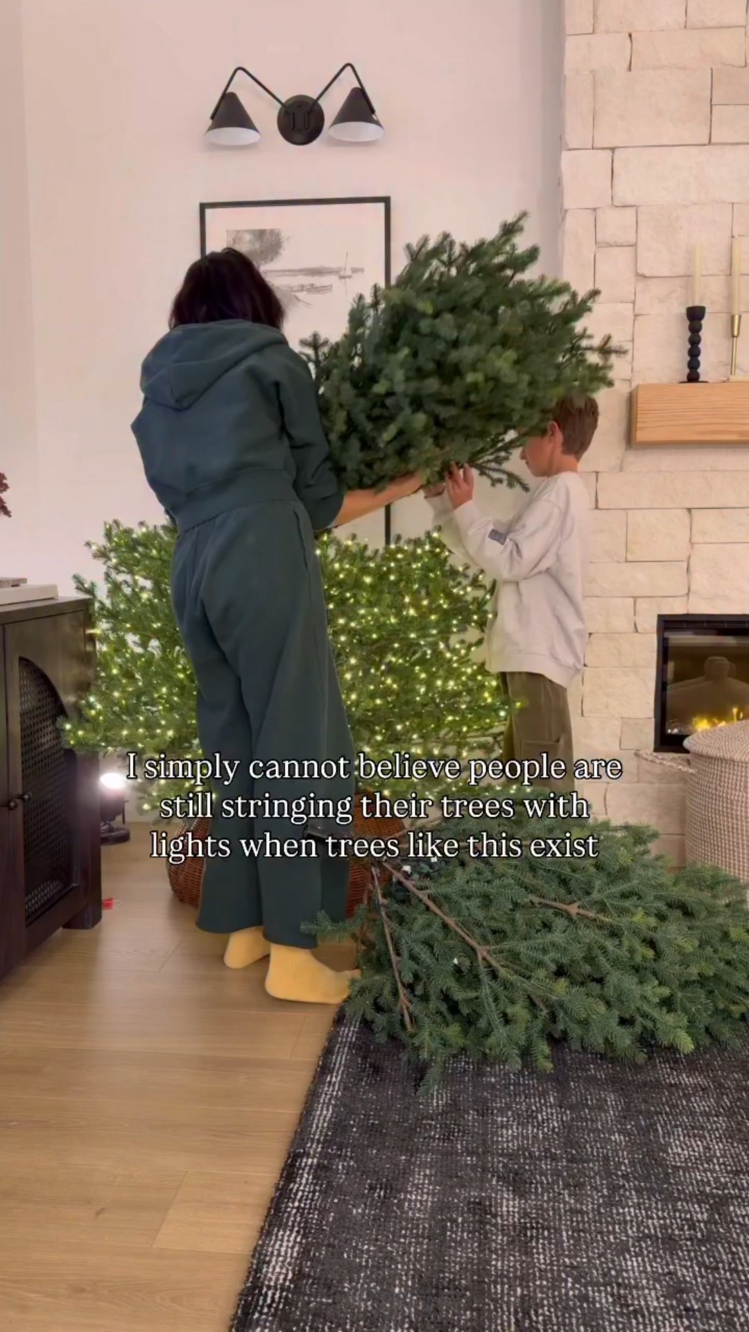 Isn’t that magic?! I can’t believe the hours that I save every year with this tree. I don’t even have to connect any strings of lights together! It just all connects through the trunk of the tree. Truly it’s magic and I can’t not be obsessed with it! 

Are you still stringing lights on your tree? It might be the one part of a 90s Chrismtas that I’m ok with not having. 😂