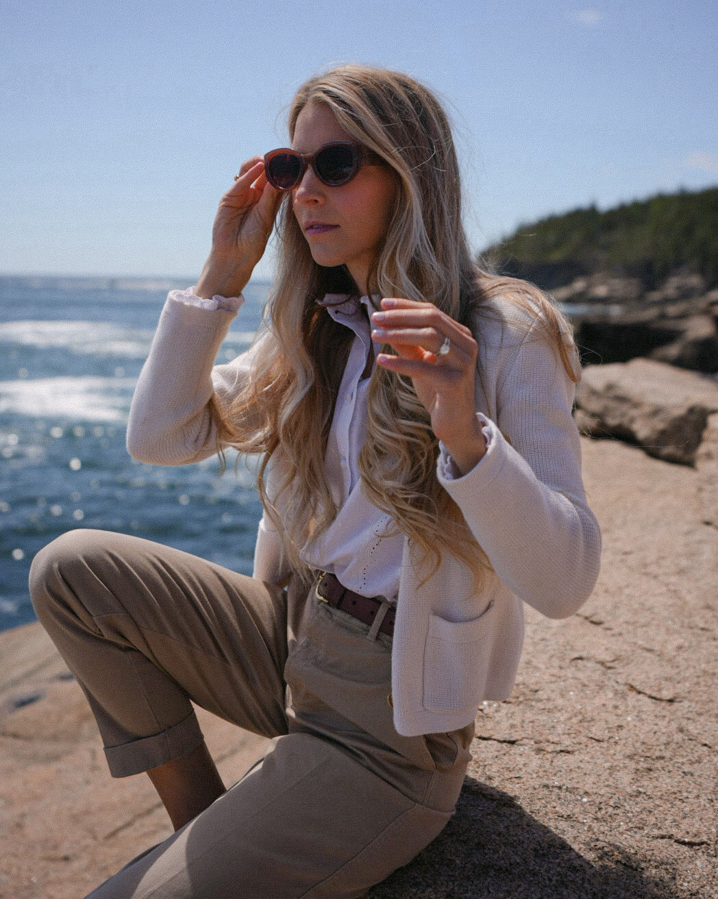 Chic travel outfit - tan pants with an embroidered top & the classic Emilie cardigan from J. Crew is the perfect classic combination.

This cardigan is SO good.
It looks great with any outfit. Seriously, dresses, skirts, pants, even athleisure. It's 100% cotton and the gold buttons add the perfect amount of femininity.

It's a great travel outfit that helps you feel and look more put together while still being comfortable.

Also, the perfect amount of layers for cool morning and warm days.

Classic style, timeless outfit, travel outfit, coastal style, vacation outfit, what to pack for Europe, European style, tan pants, White cotton shirt, cardigan with gold buttons, jcrew, Sezane, spring, fall, easy travel outfit, summer travel outfits, coastal outfit, beach day, west coast, east coastt

#LTKStyleTip #LTKShoeCrush #LTKTravel